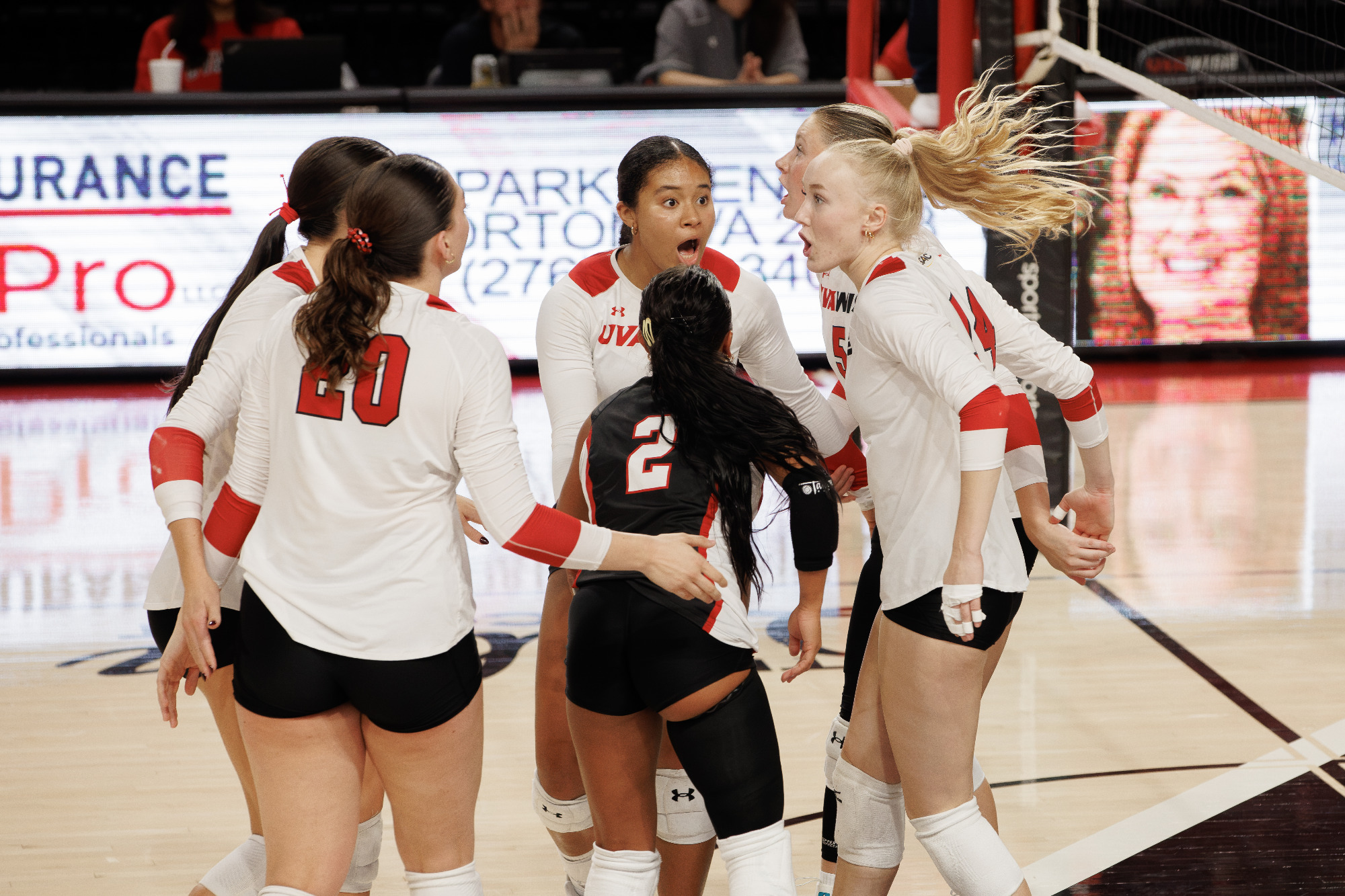The team celebrates a point against Lenoir-Rhyne in the third set -- 10-2-2026