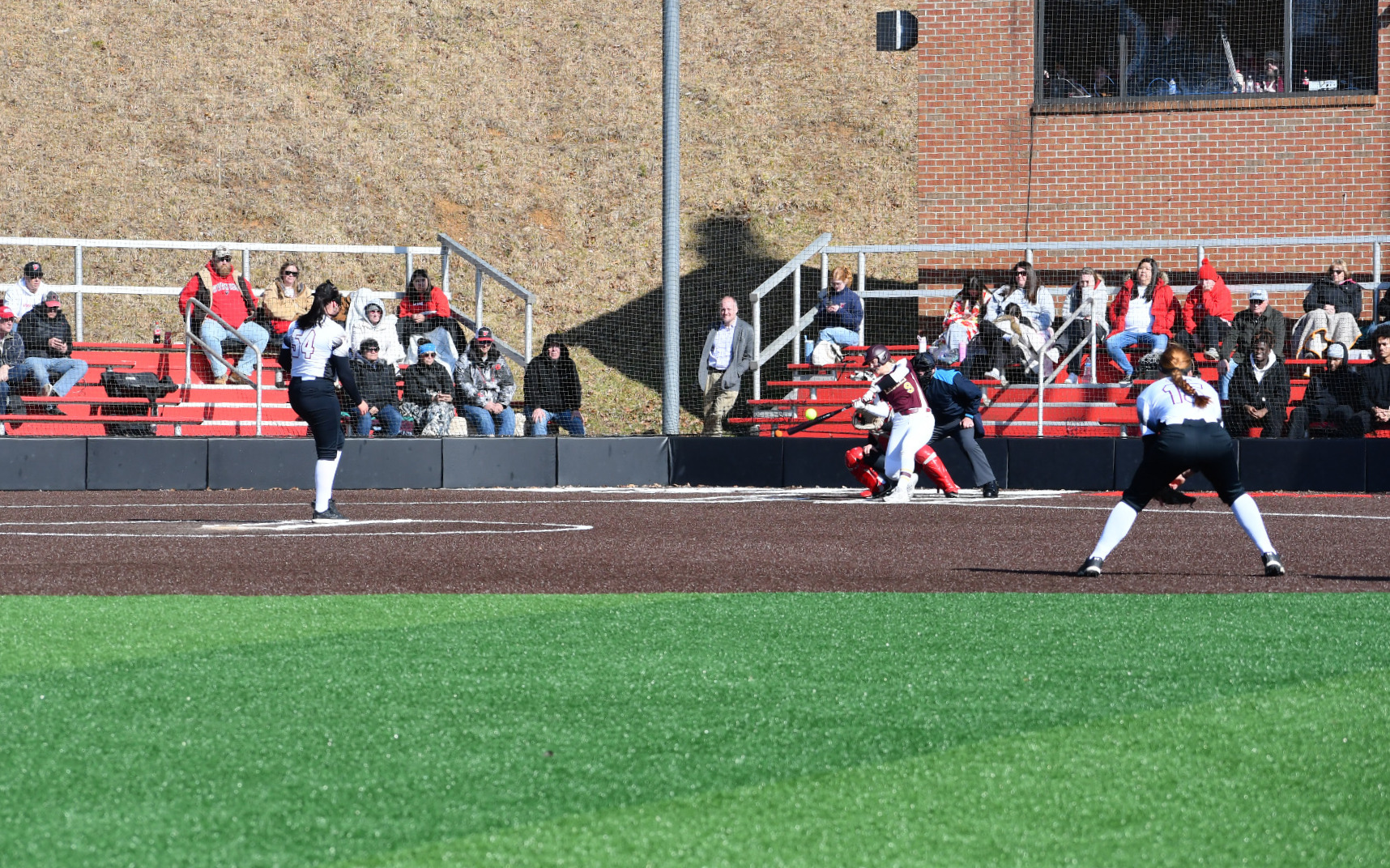 UC's Taylor Hodson gets the hit off of Olivia Shockley -- 2-13-26