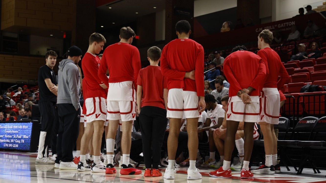 Team huddles during a timeout vs Newberry - 2025-26