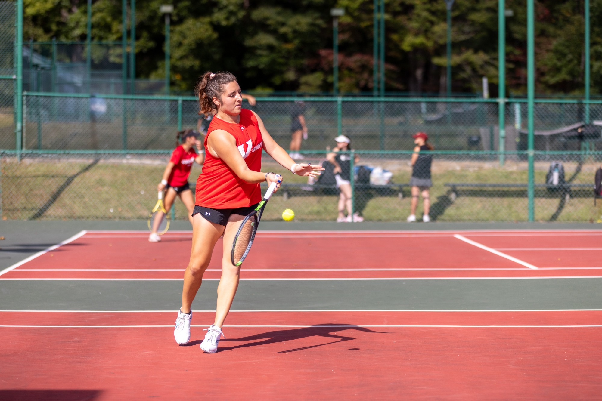 Christina Korakopoulou hits the ball against Southern Virginia - 2025-26