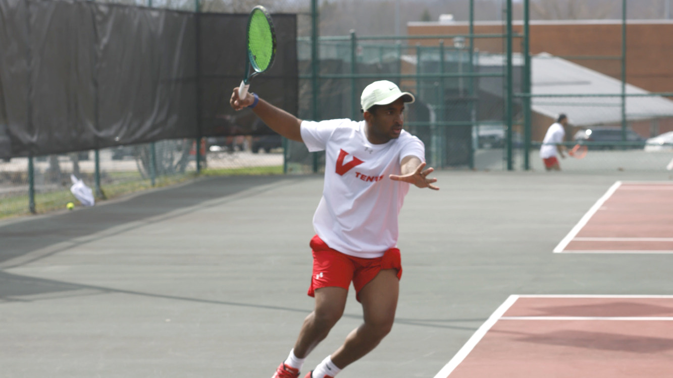Men's Tennis player volleys the ball against Catawba -- 2025-26