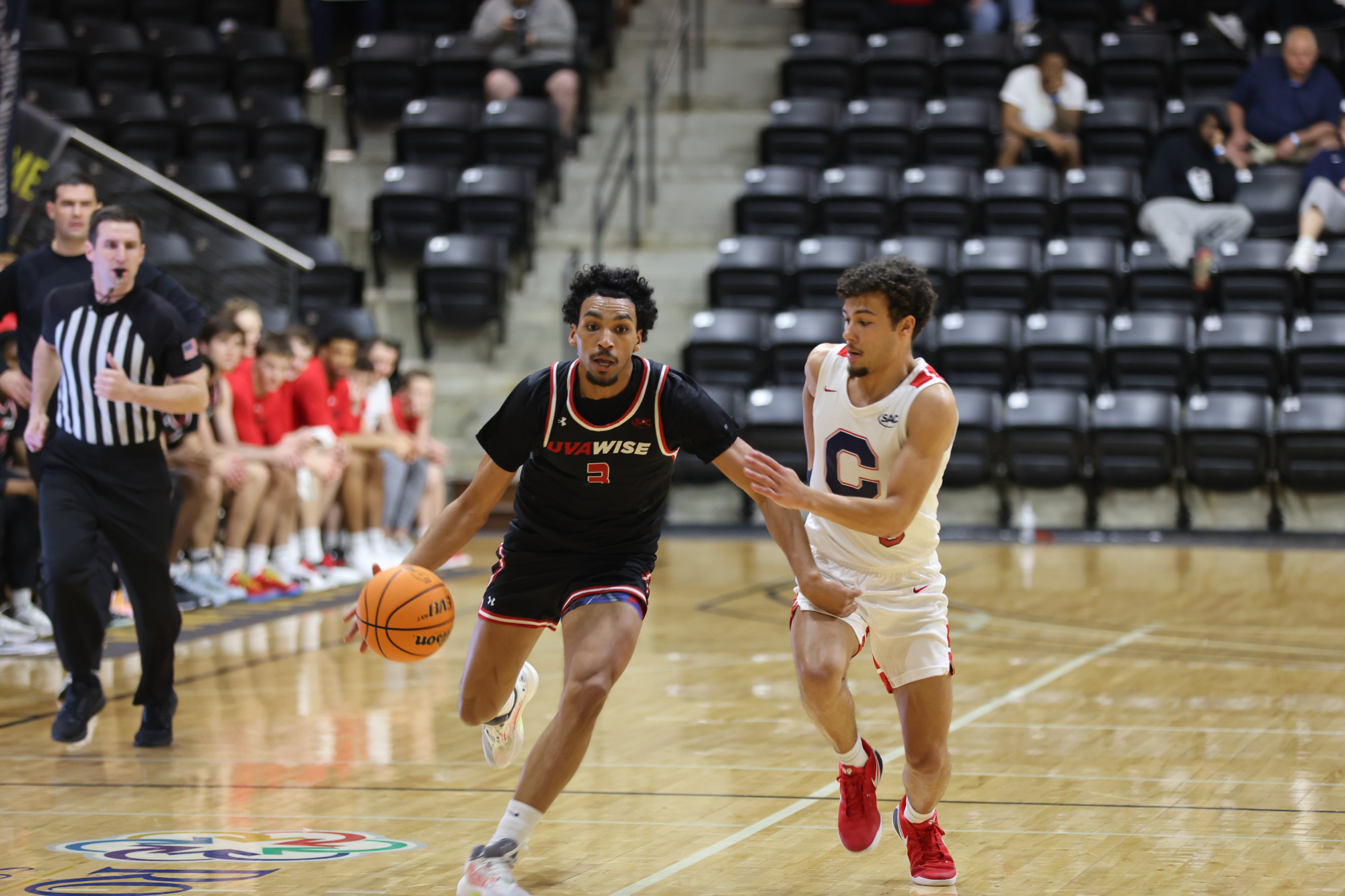 Patrick Shelley drives the ball up the court in the SAC Tournament Quarterfinals -- 2025-26