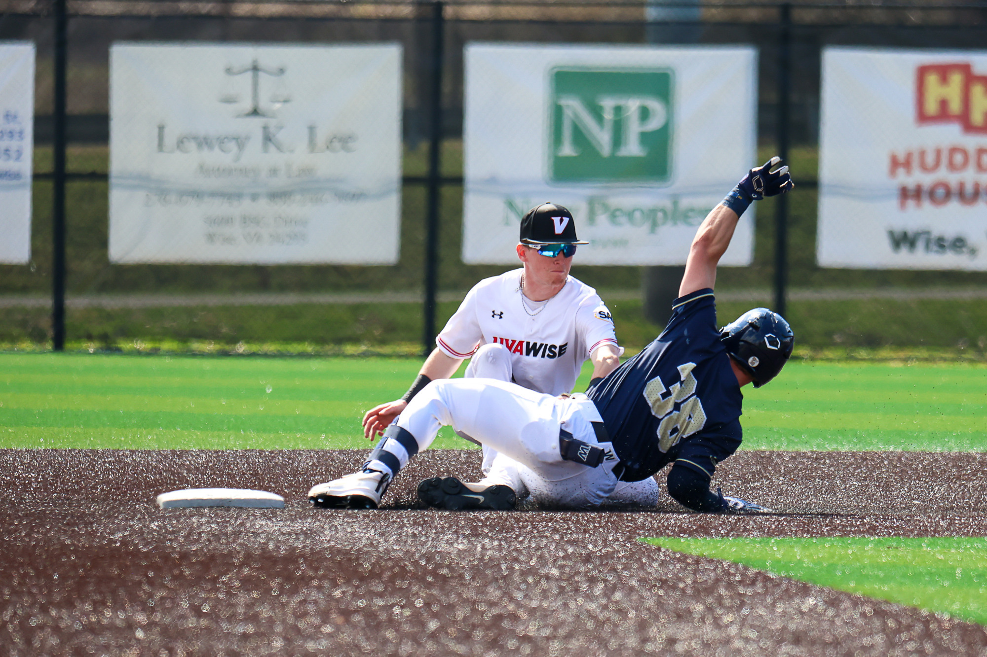 A Wingate player is tagged out while sliding into a base -- 2026