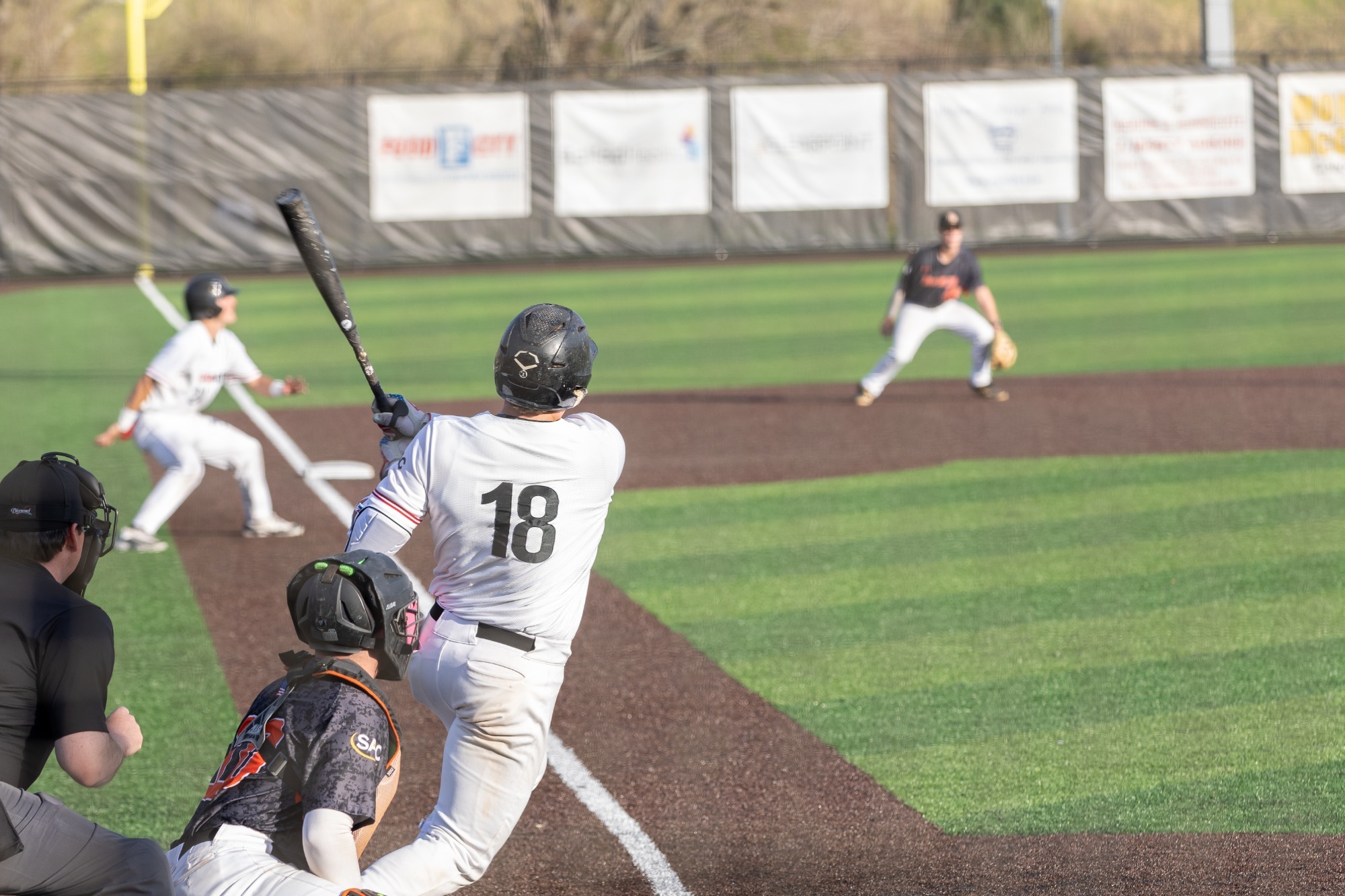 Carter Babb hits the ball vs Tusculum - 2026