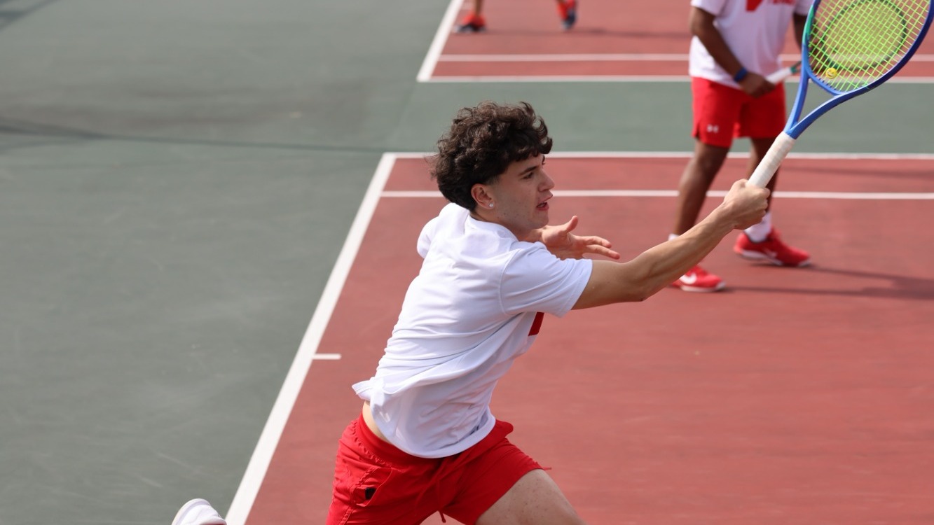 Men's Tennis Player returns a volley vs. Catawba - 2025-26