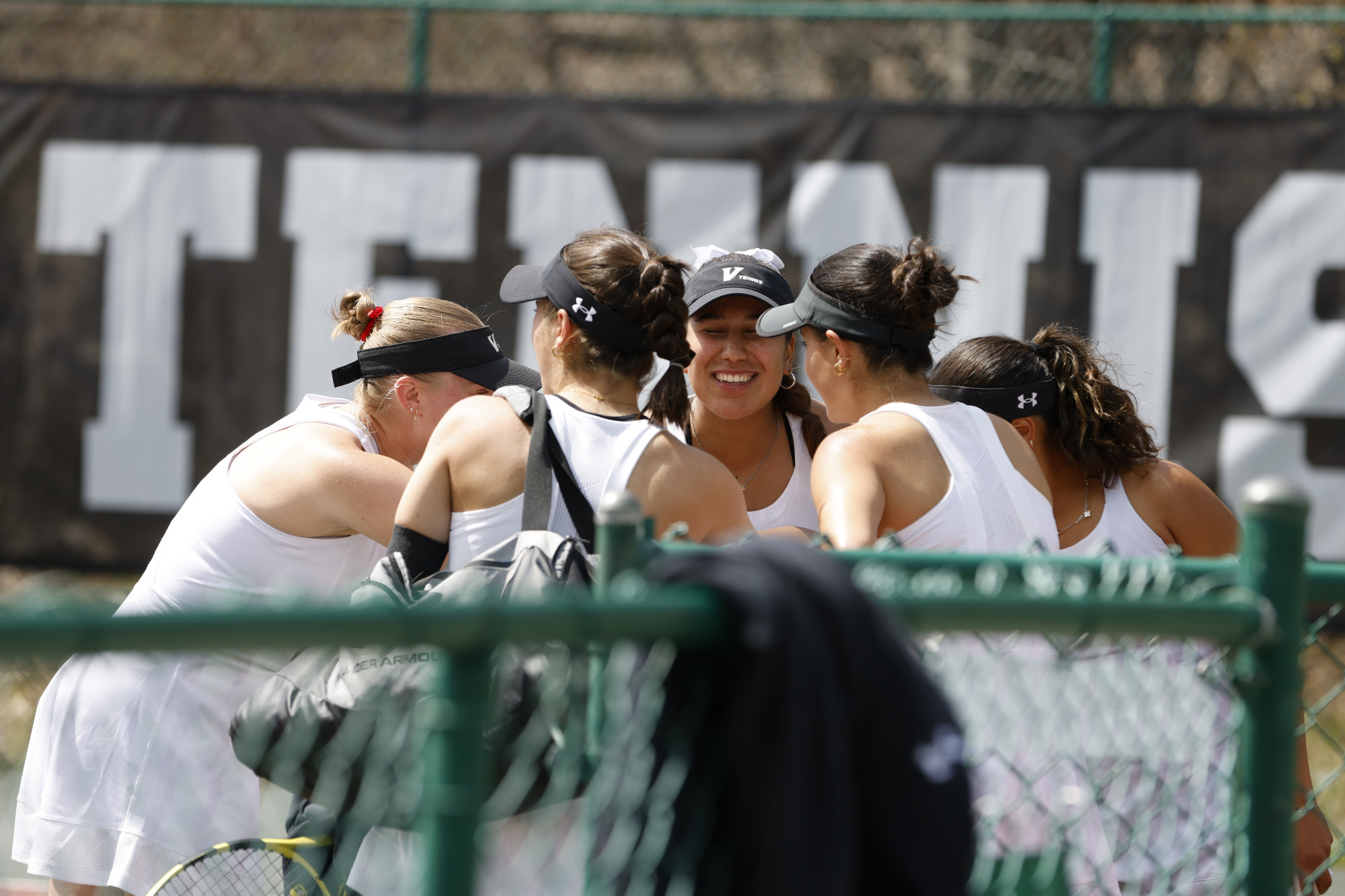 Women's Tennis team huddles before the Emory & Henry match - 2026