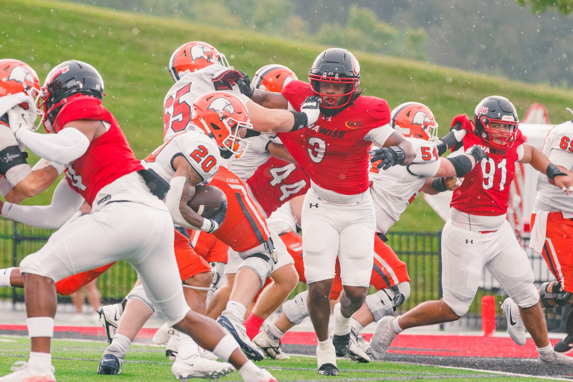 Jalen Pickens tries to get to C-N's Kayden McCoy but is held by Henry Bertucci -  9-19-2026