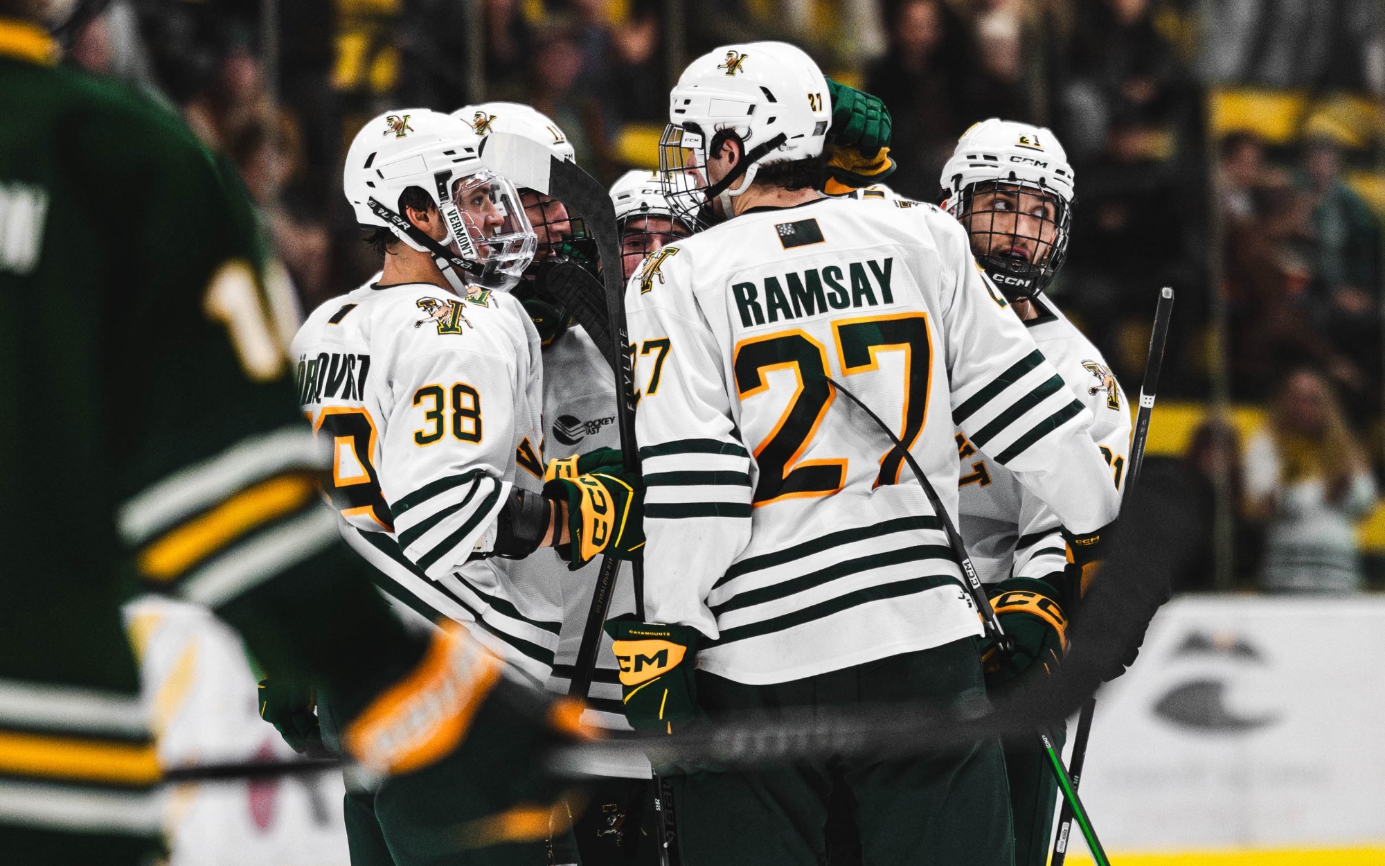 Catamounts huddle around Daniel Sambuco after the game-winning goal Friday night