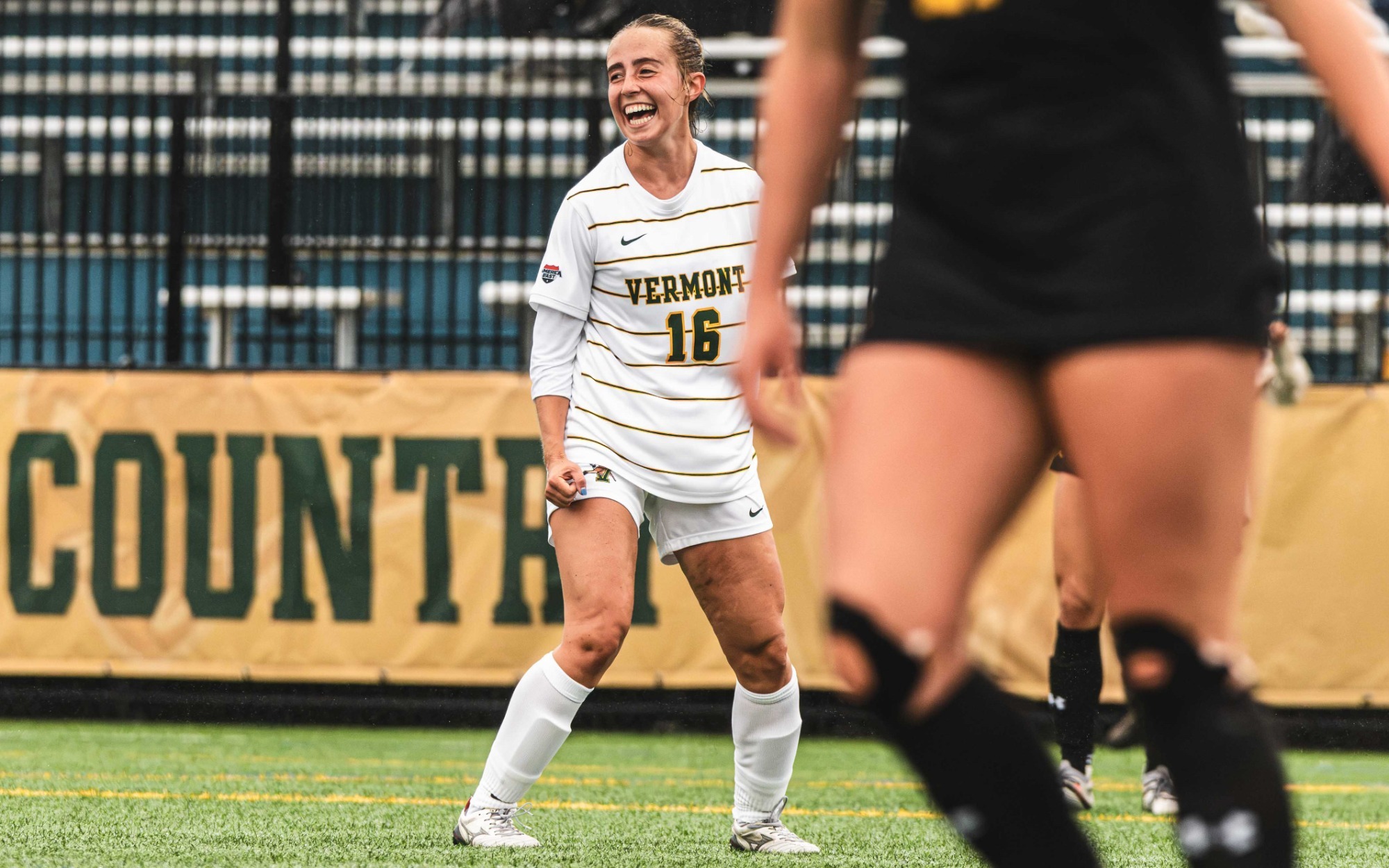 Eleni Stowell celebrates UVM's second goal of the game against UMBC