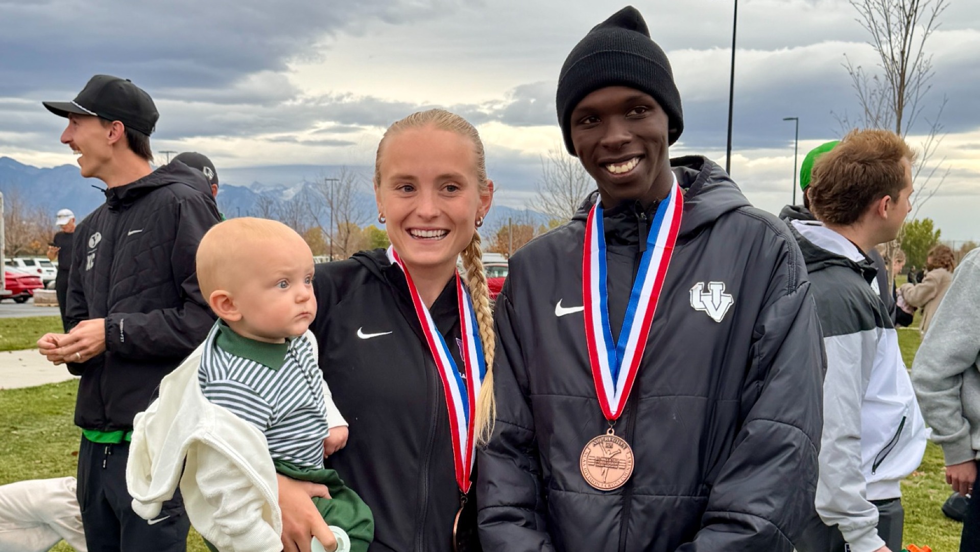 Morgan Nokes and Sila Kiplagat with their All-Region medals at the NCAA Mountain Regionals
