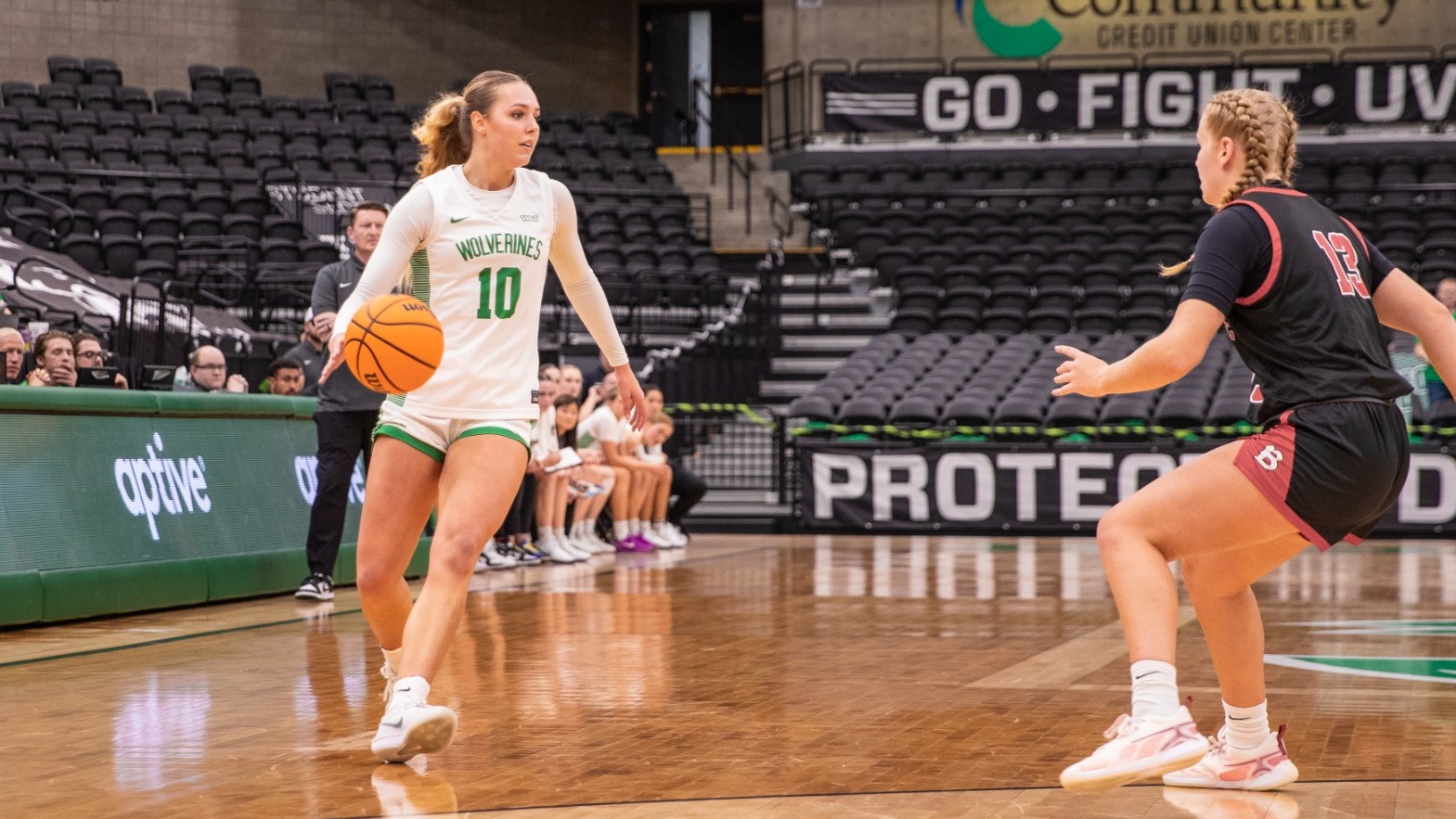 Saige Gibb drives to the basket