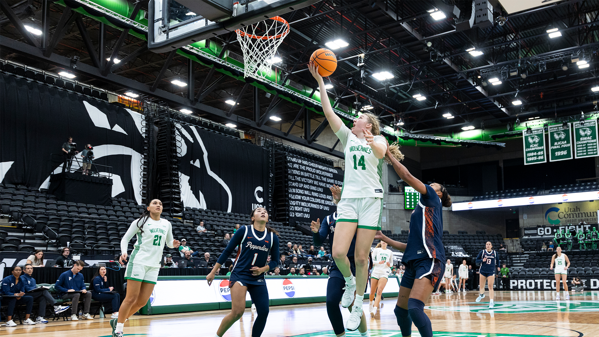 Kaylee Headrick drives to the bucket