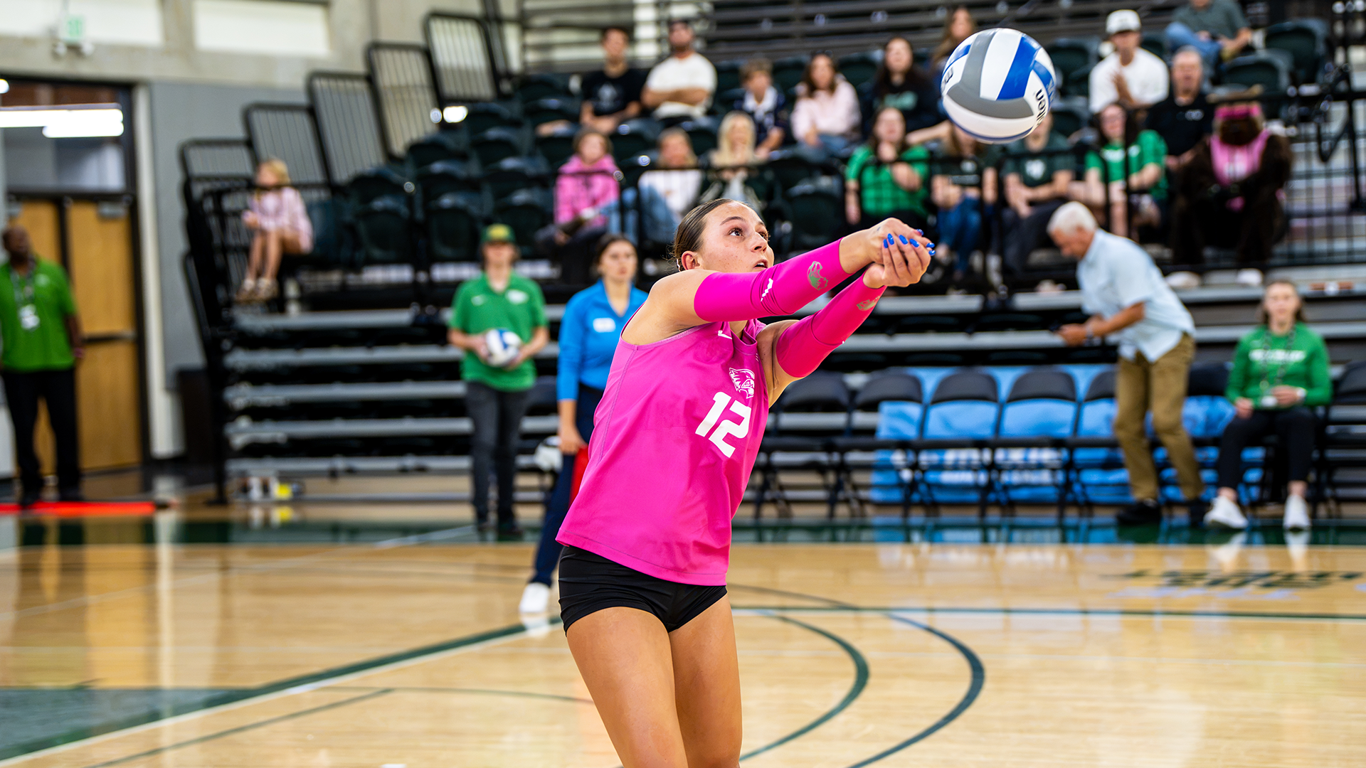 Kenna McClure passes against Cal Poly