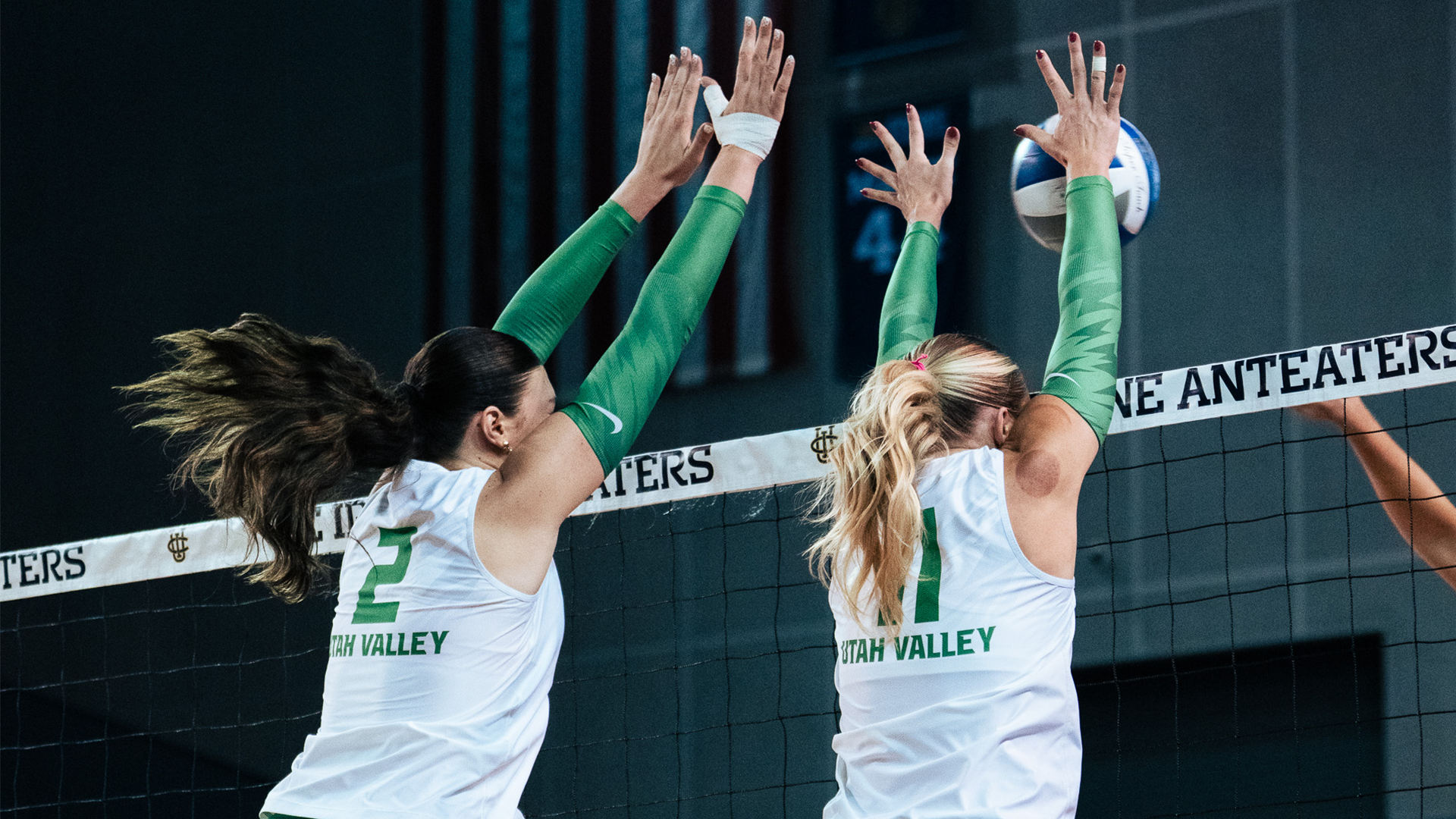 Alyvia Watkins and Evalyn Medaris go for the block against UCI
