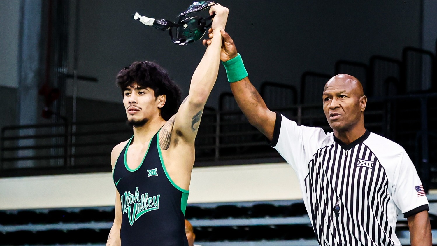 Zyon Trujillo gets his hand raised after a win vs Wyoming