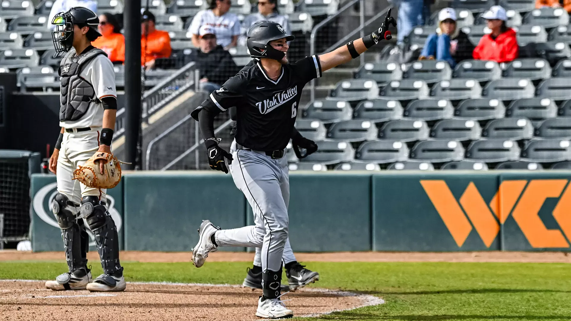 Trenton Rowan celebrates after hitting a homer