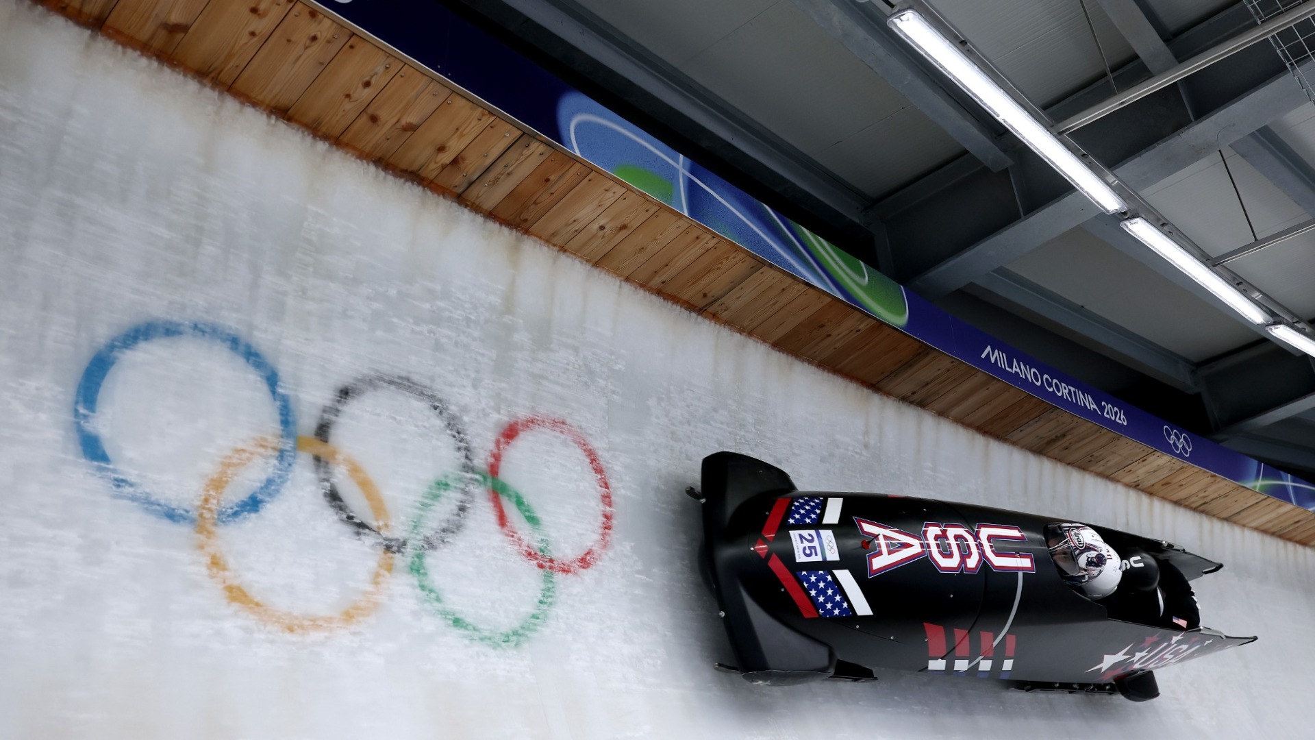 CORTINA D'AMPEZZO, ITALY - FEBRUARY 19: Kristopher Horn of Team United States pilots his team as they participate in heat four of the 4-man Bobsleigh training on day thirteen of the Milano Cortina 2026 Winter Olympic games at Cortina Sliding Centre on February 19, 2026 in Cortina d'Ampezzo, Italy. (Photo by Richard Heathcote/Getty Images)