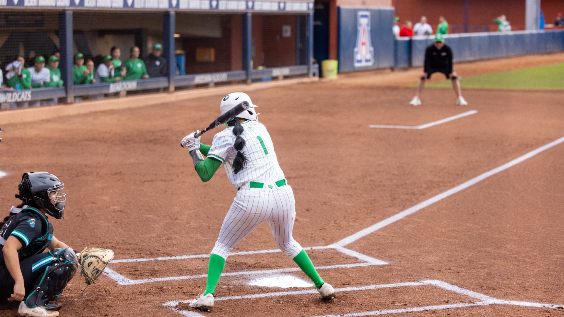 Amber Rodriguez takes an AB against Coastal Carolina at the Bear Down Fiesta in Arizona.