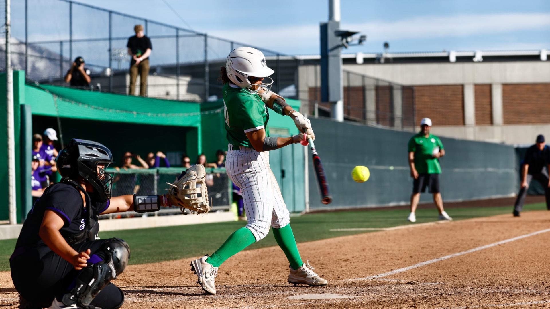 Angelique Mann hits the ball vs Weber State