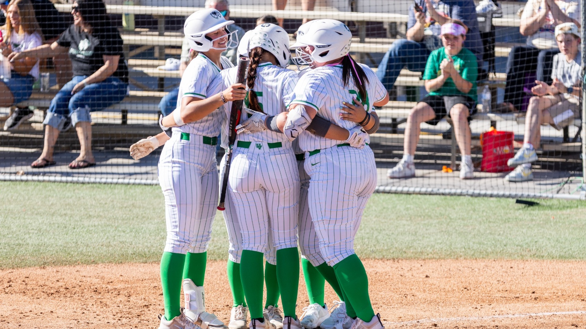 Tatum Hall celebrates her grand slam vs UTU