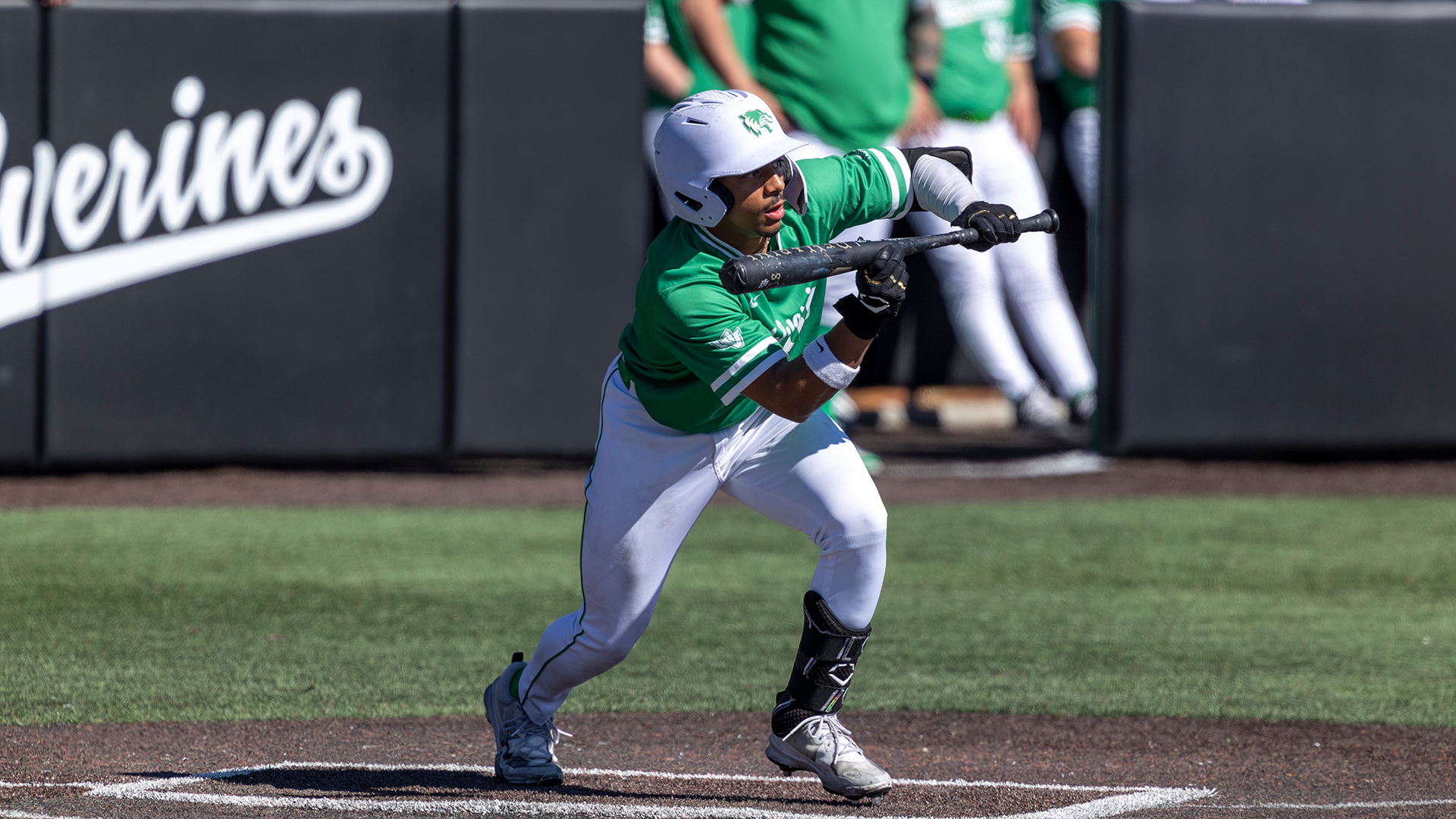 DJ Massey bunts against Cincinnati