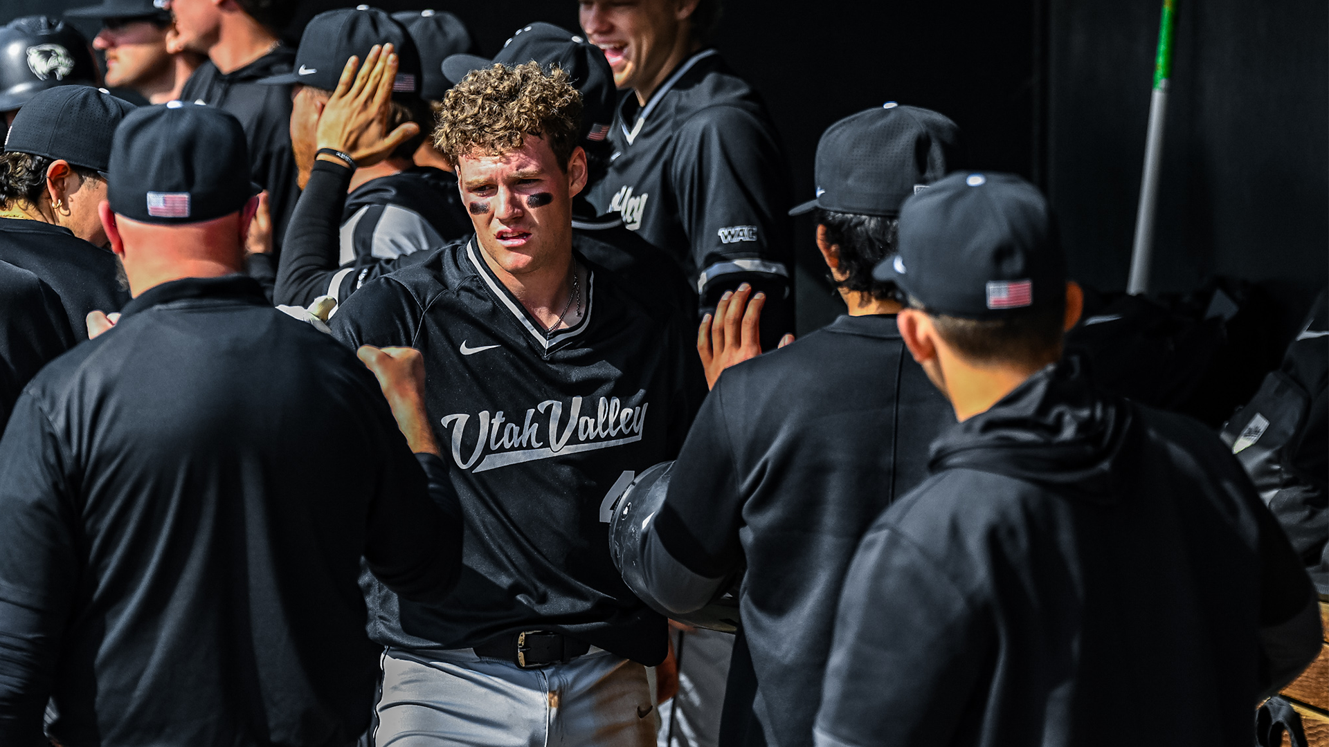 Mason Strong celebrates a homer at Pacific