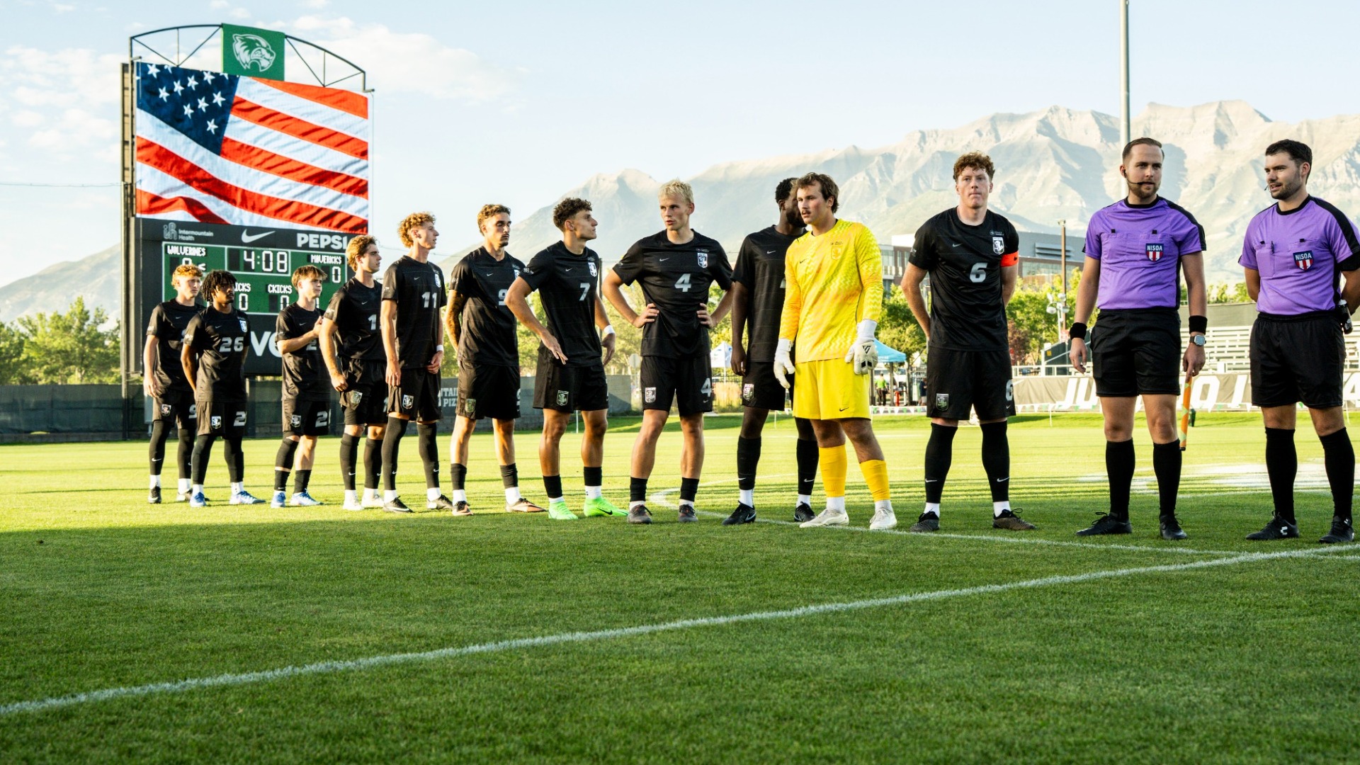 Team lines up for the national anthem