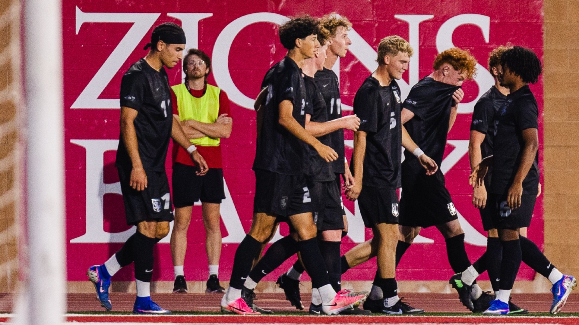 Team celebrates Brayden Tester's goal at UTU