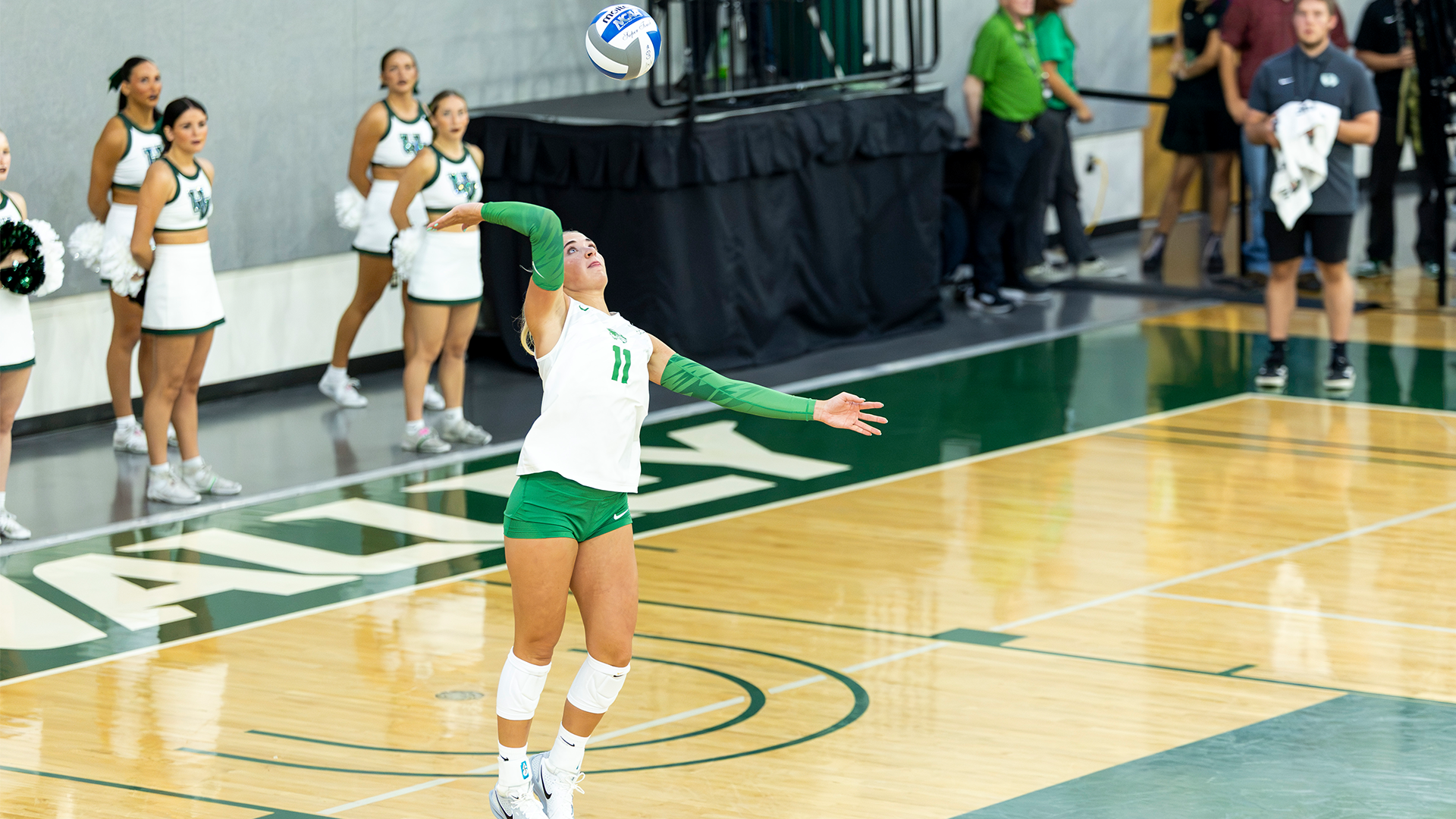 Evi Medaris serves against Utah Tech