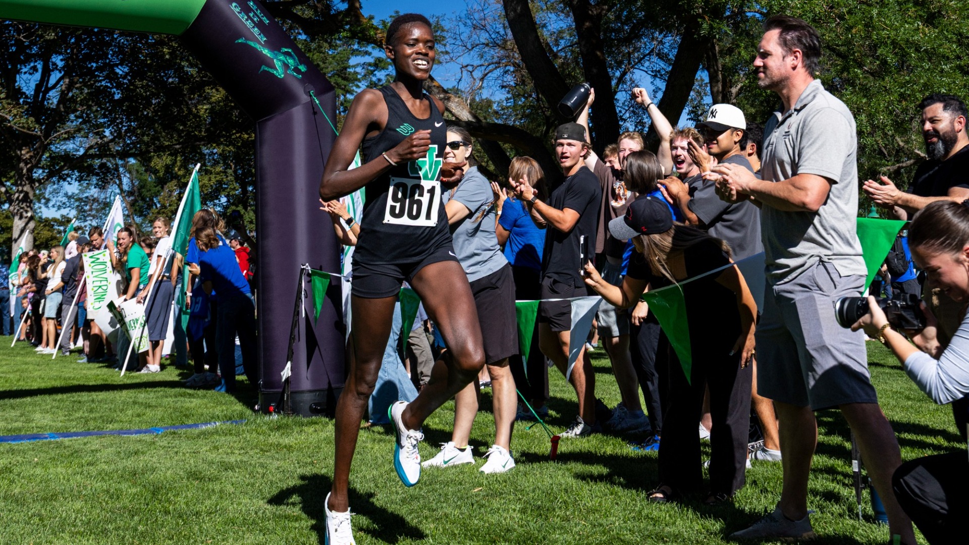 Caren Kipsirat crosses the finish line at the UVU Invitational