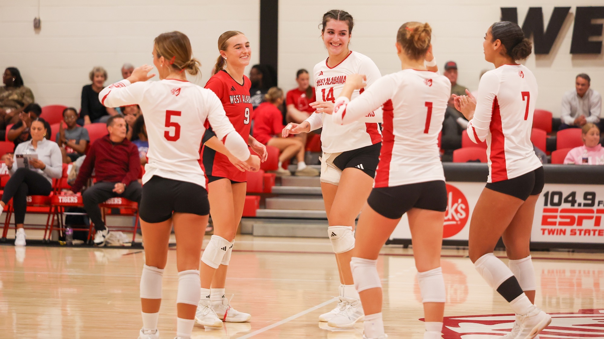 West Alabama volleyball players gather and celebrate on the court during a match against Miles College at Pruitt Hall on Sept. 10, 2026.