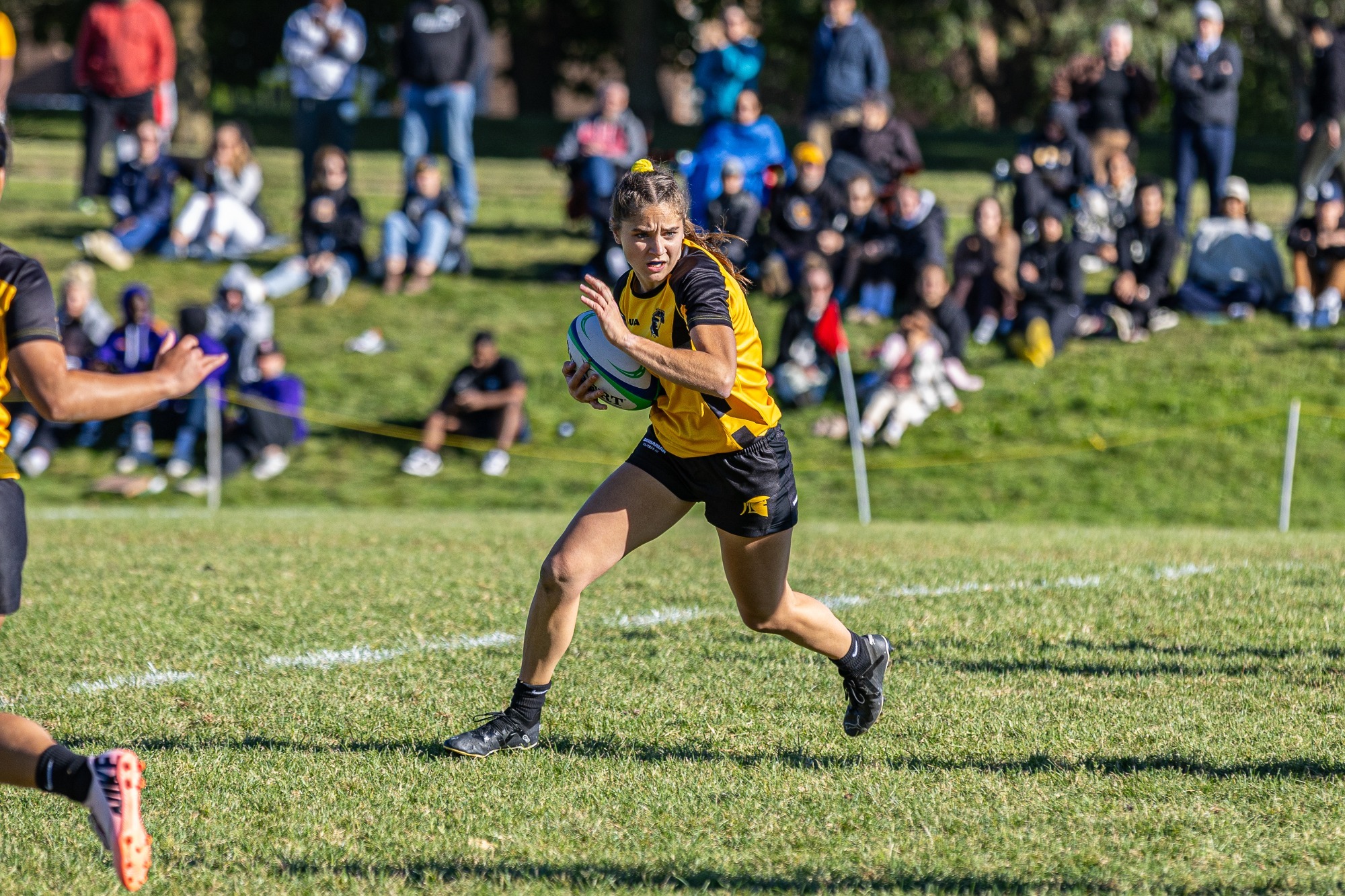 Warriors rush up the field.