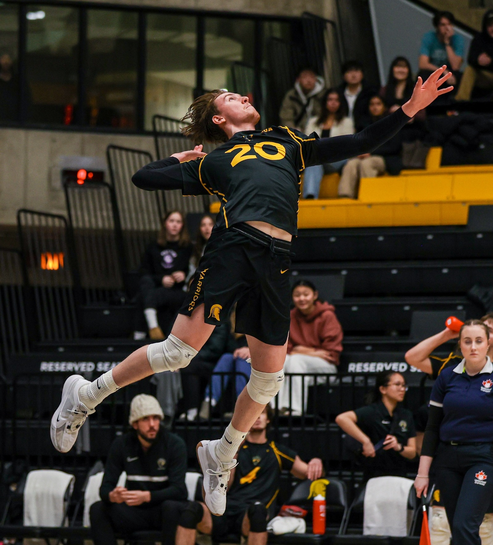 Warrior hitting the ball.