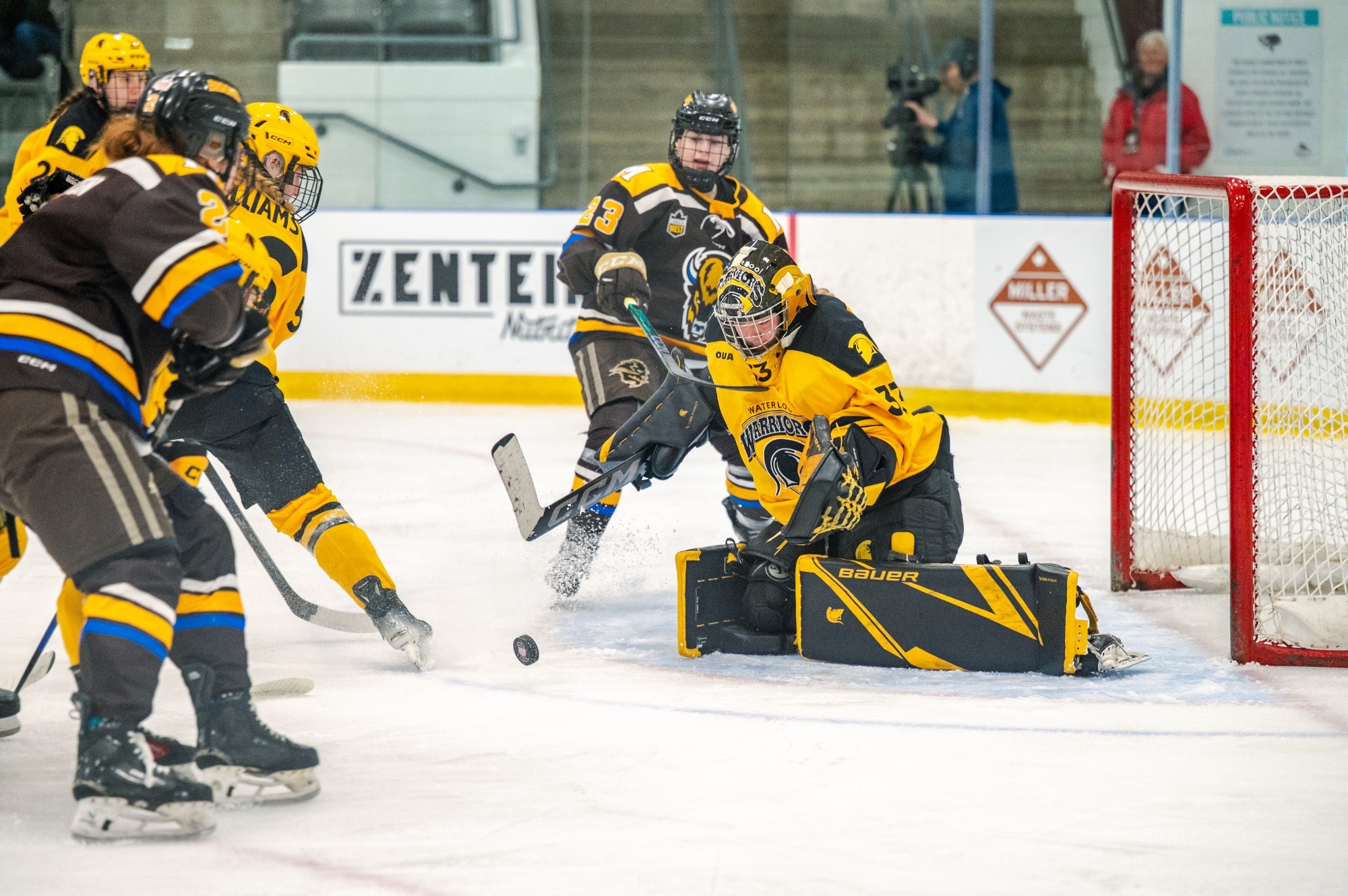 Kara Mark makes a save against Manitoba