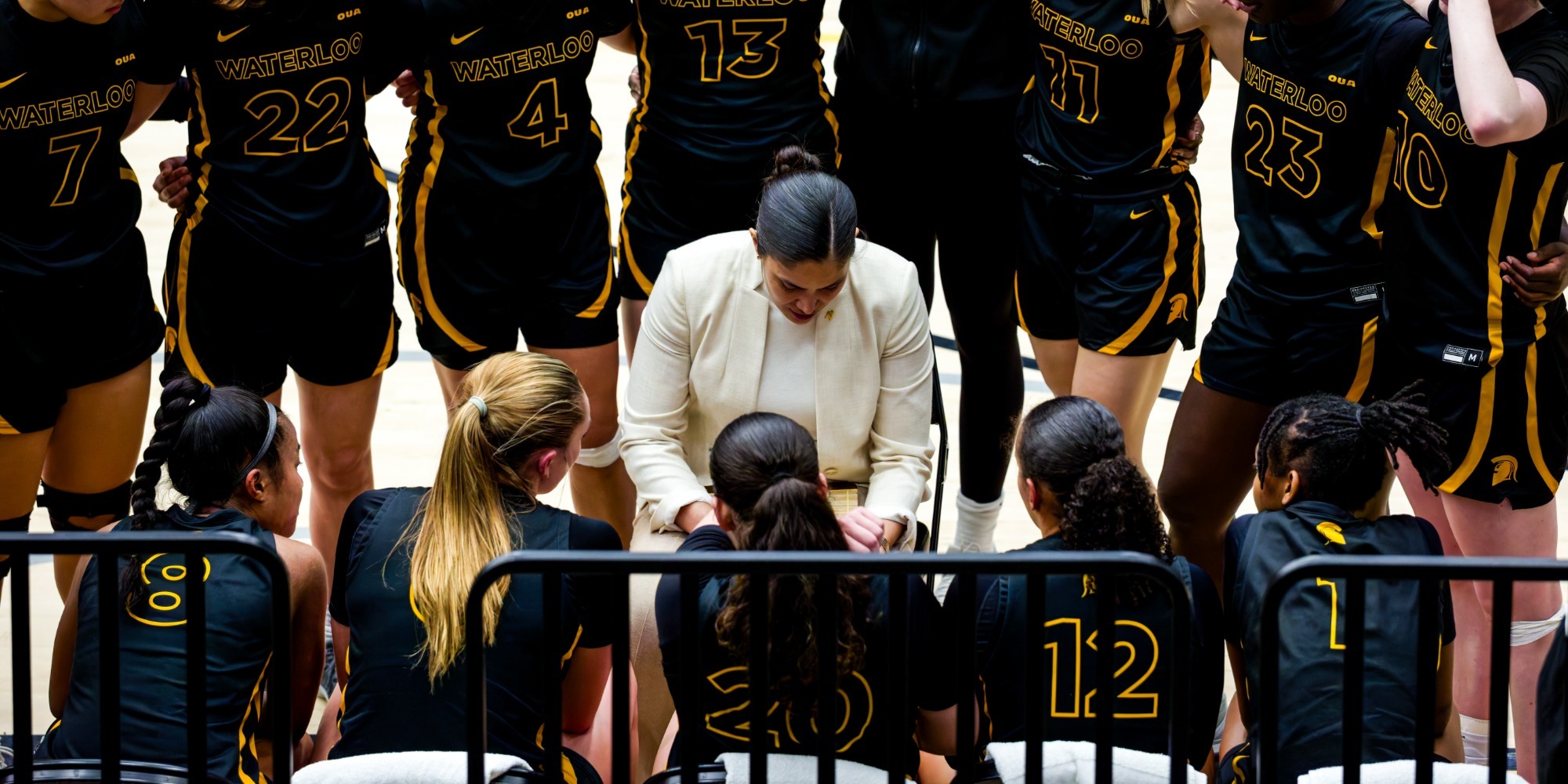 Jessica Roque leads a huddle