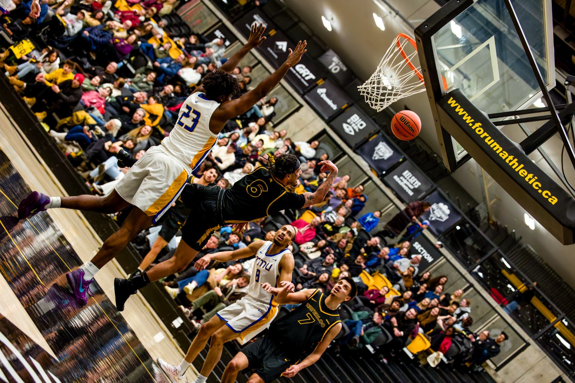 Isaiah Mcrae drives it hard into the paint.