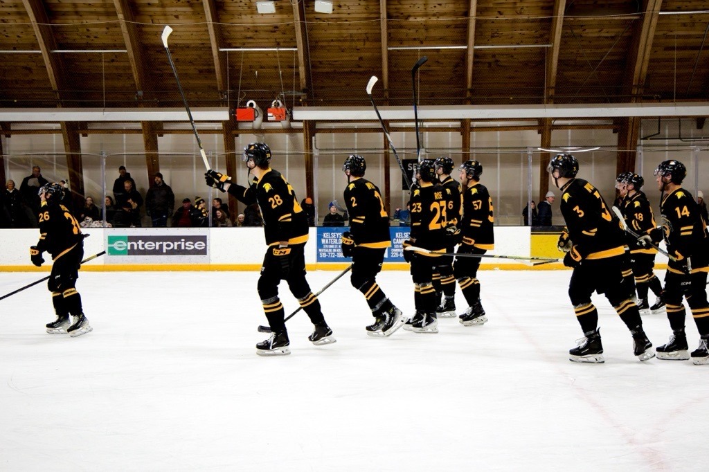 Men's Hockey celebrates a win