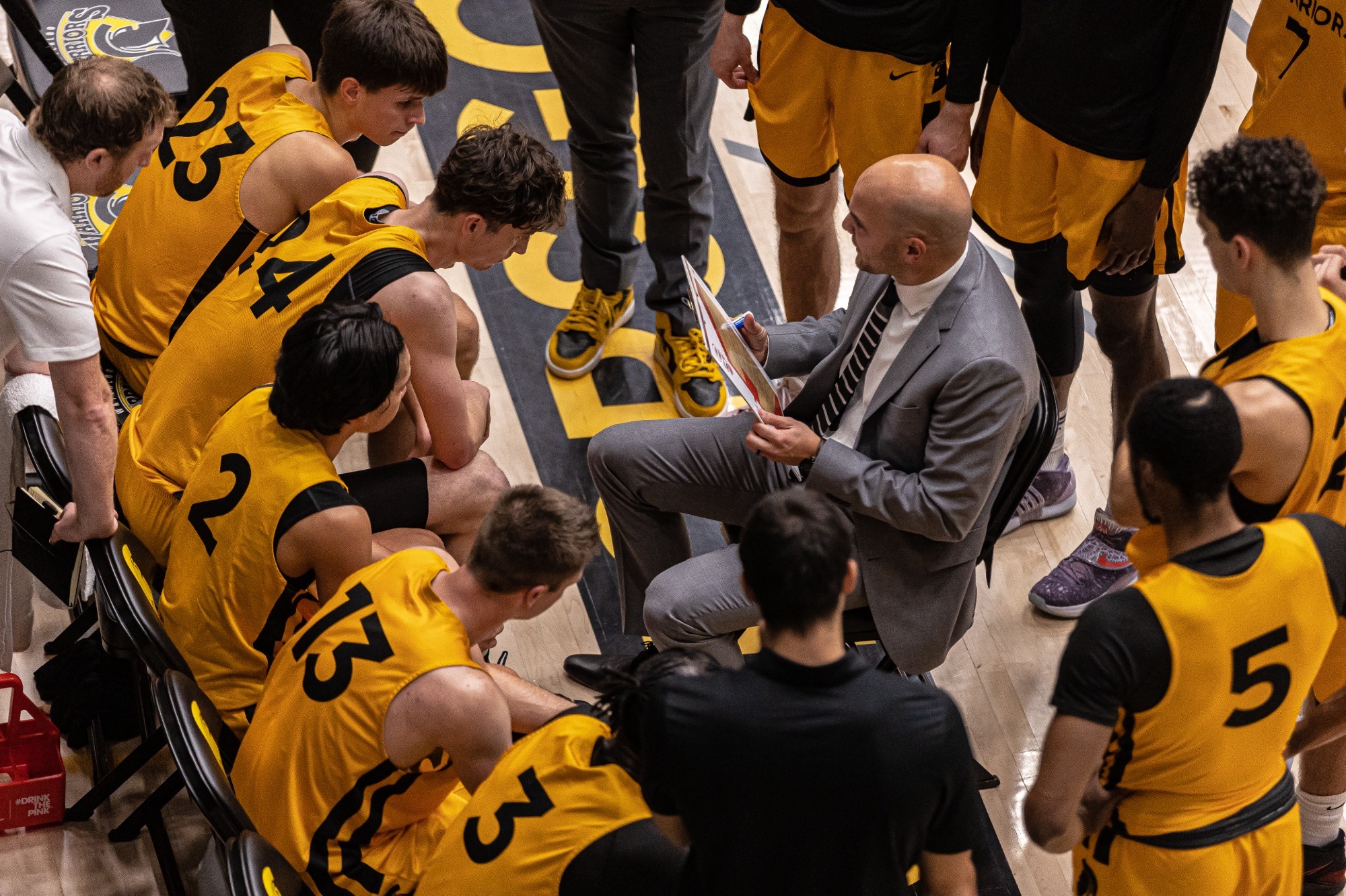 Men's Basketball, Huddle Around Troy