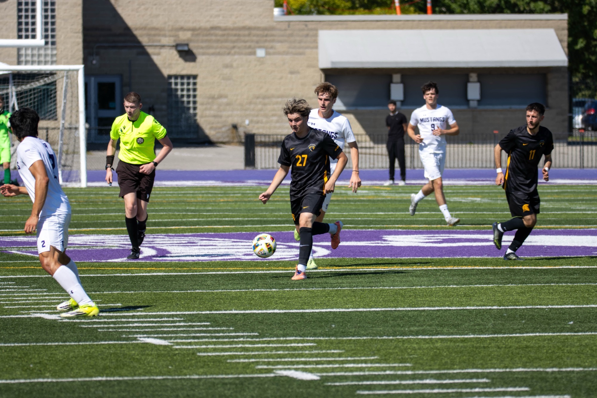 Noah Ceolin holds the ball against Western