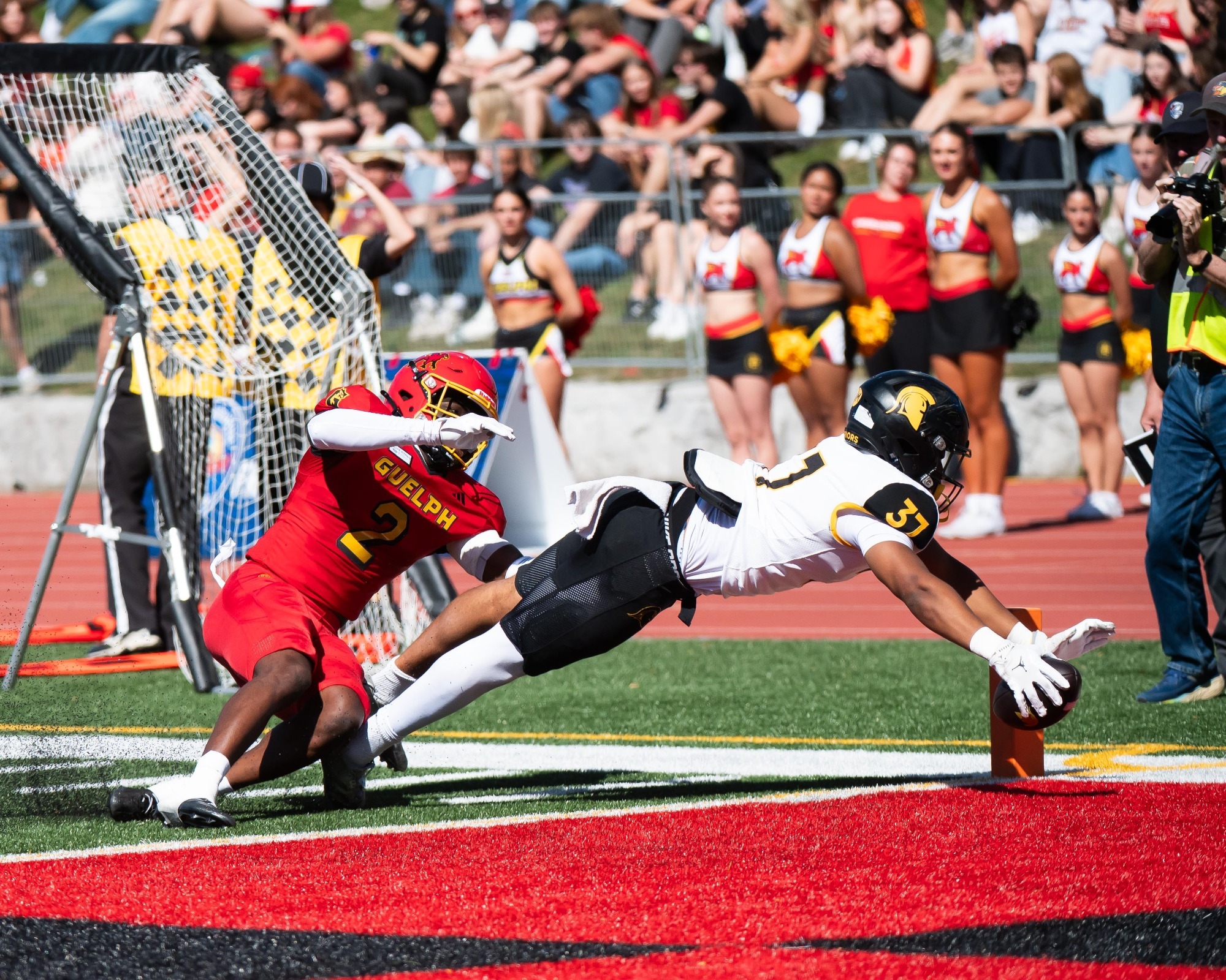 Elijah Pappin dives for a TD