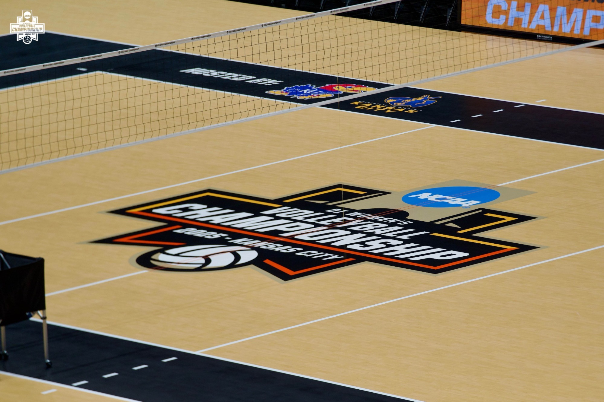 NCAA Women’s Volleyball Championship court with Kansas City branding.