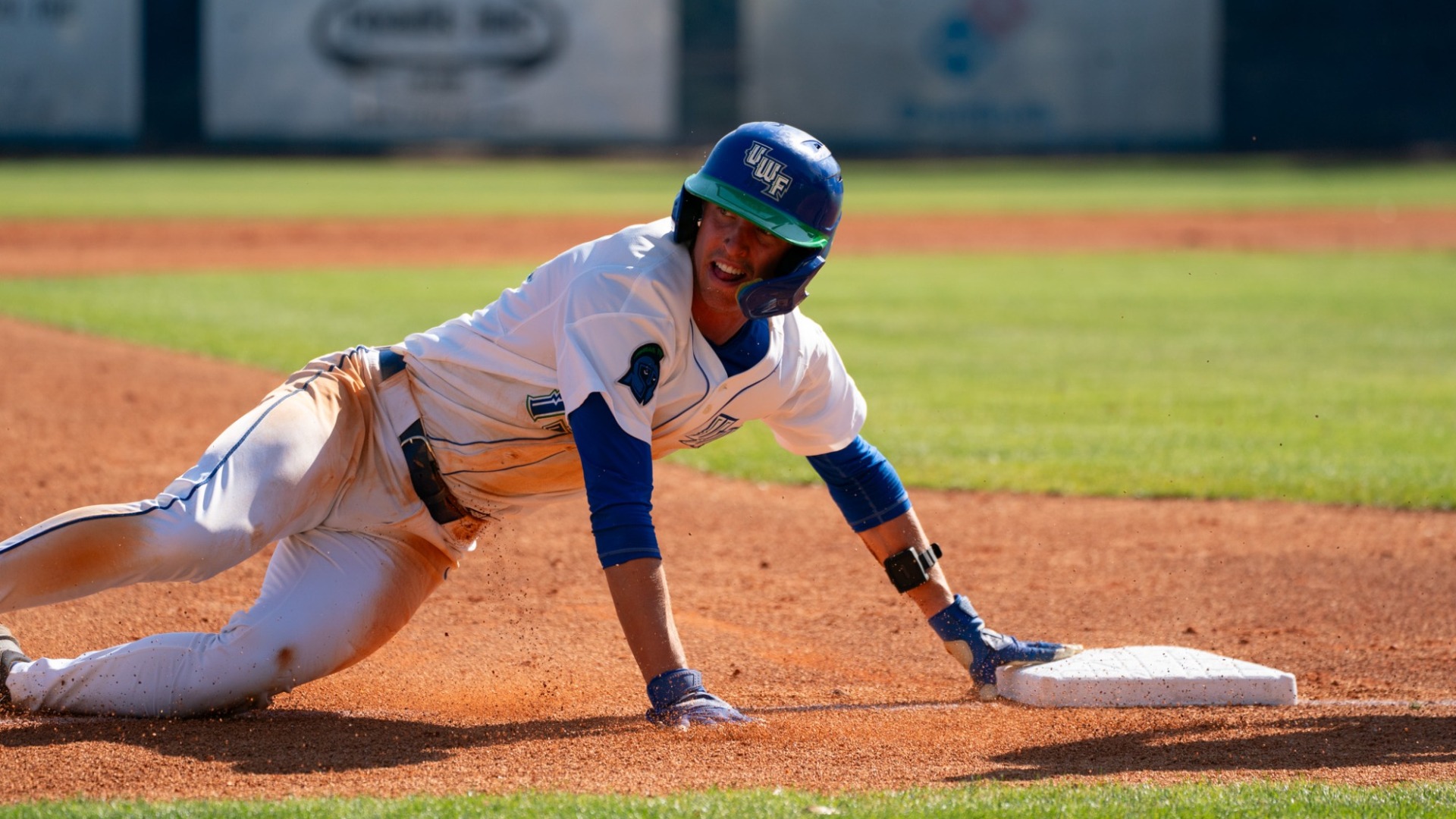 Trent Kelly sliding into base