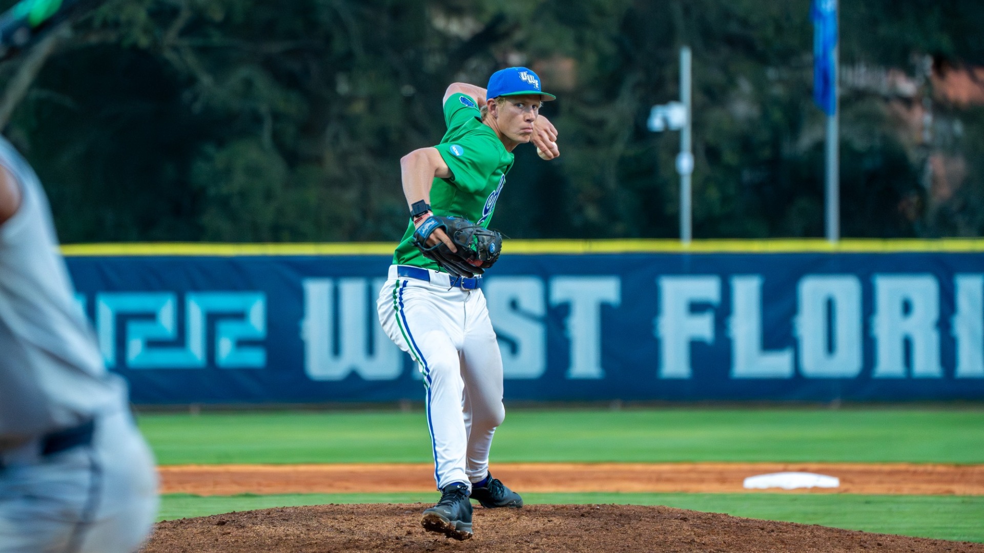 Garrett Brewer throwing on the mound