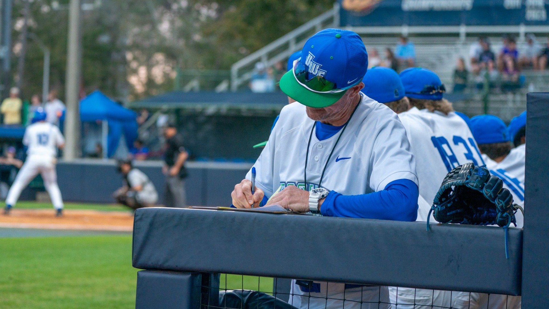 Coach Jeffcoat writing a lineup