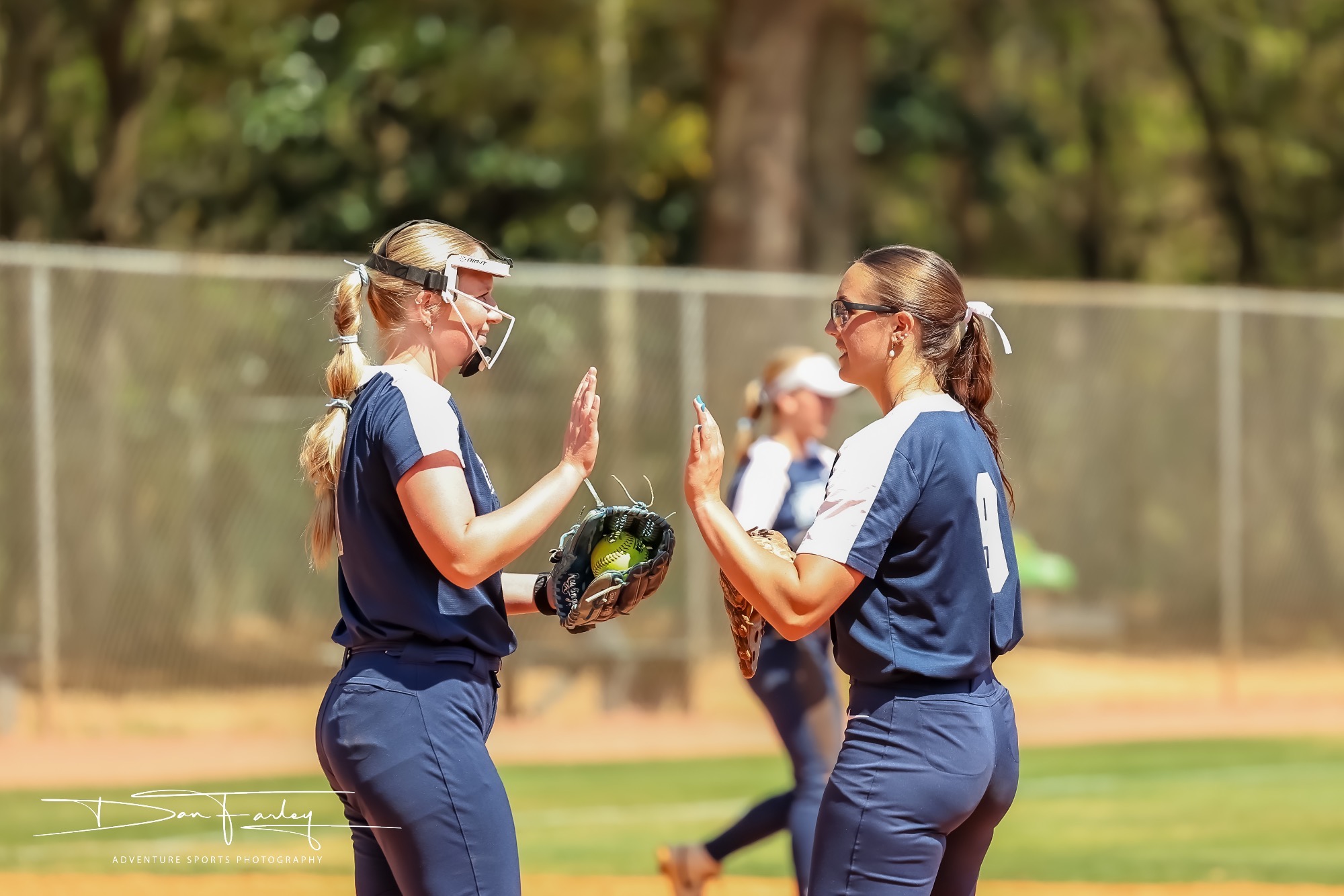Haley Guffey high five Hannah Harper