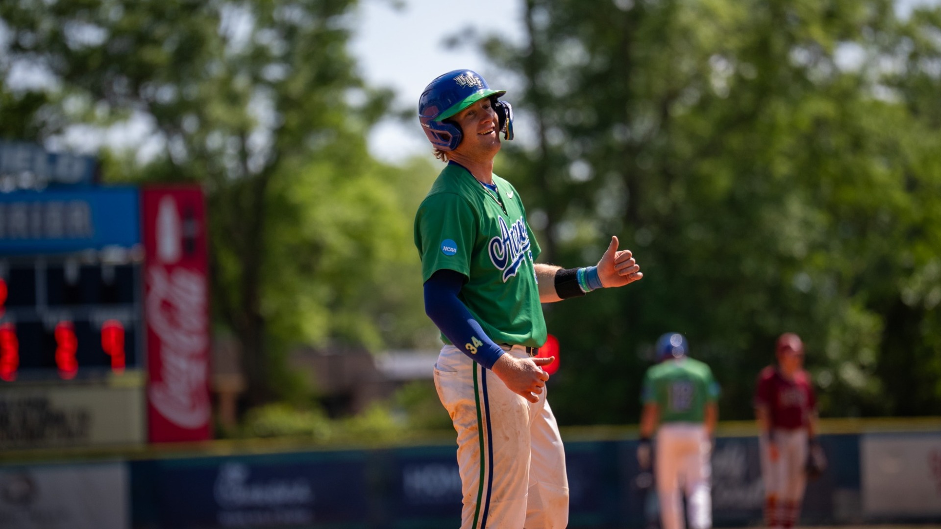 William Lybrook celebrates on third base