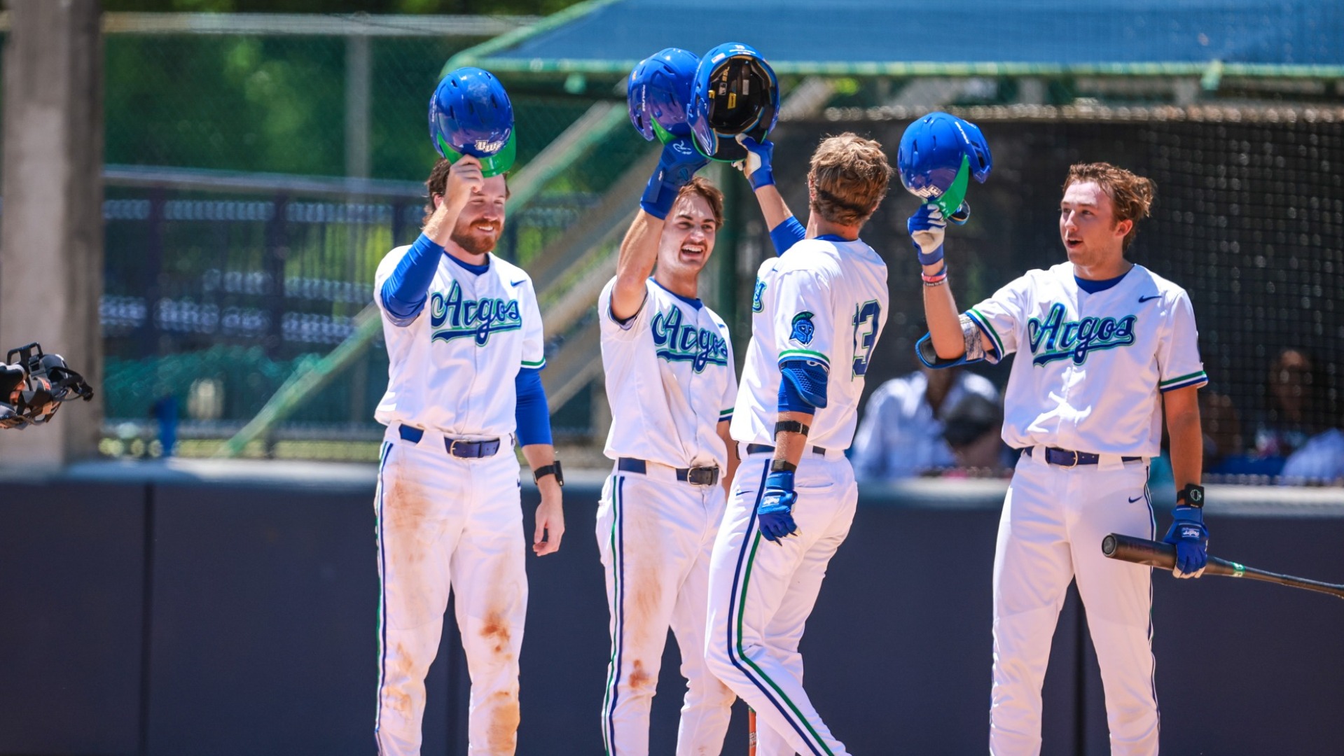 Trent Kelly and others celebrate his homerun at home plate