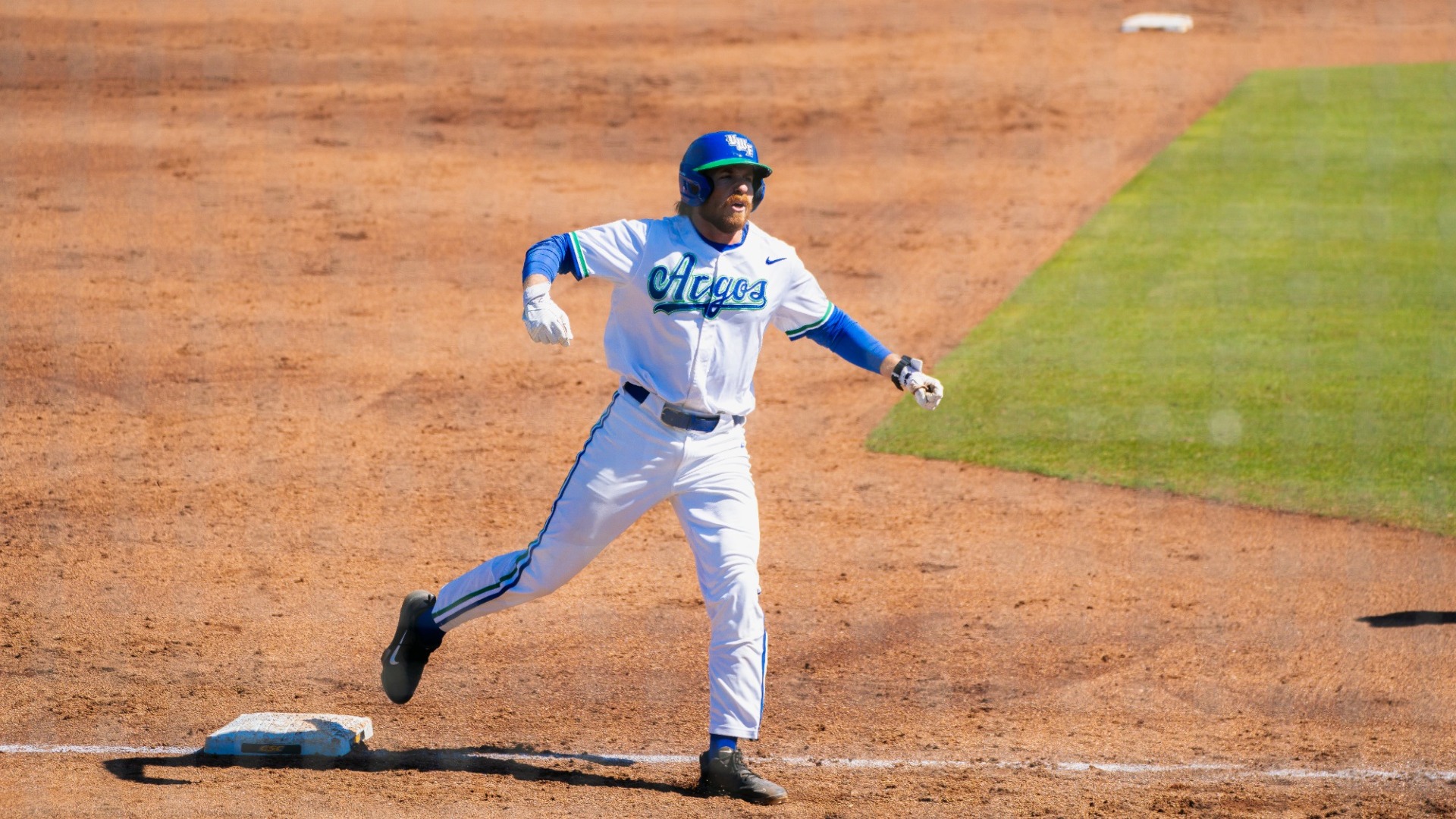 Zack Stokes rounding third and celebrating his home run vs TNU
