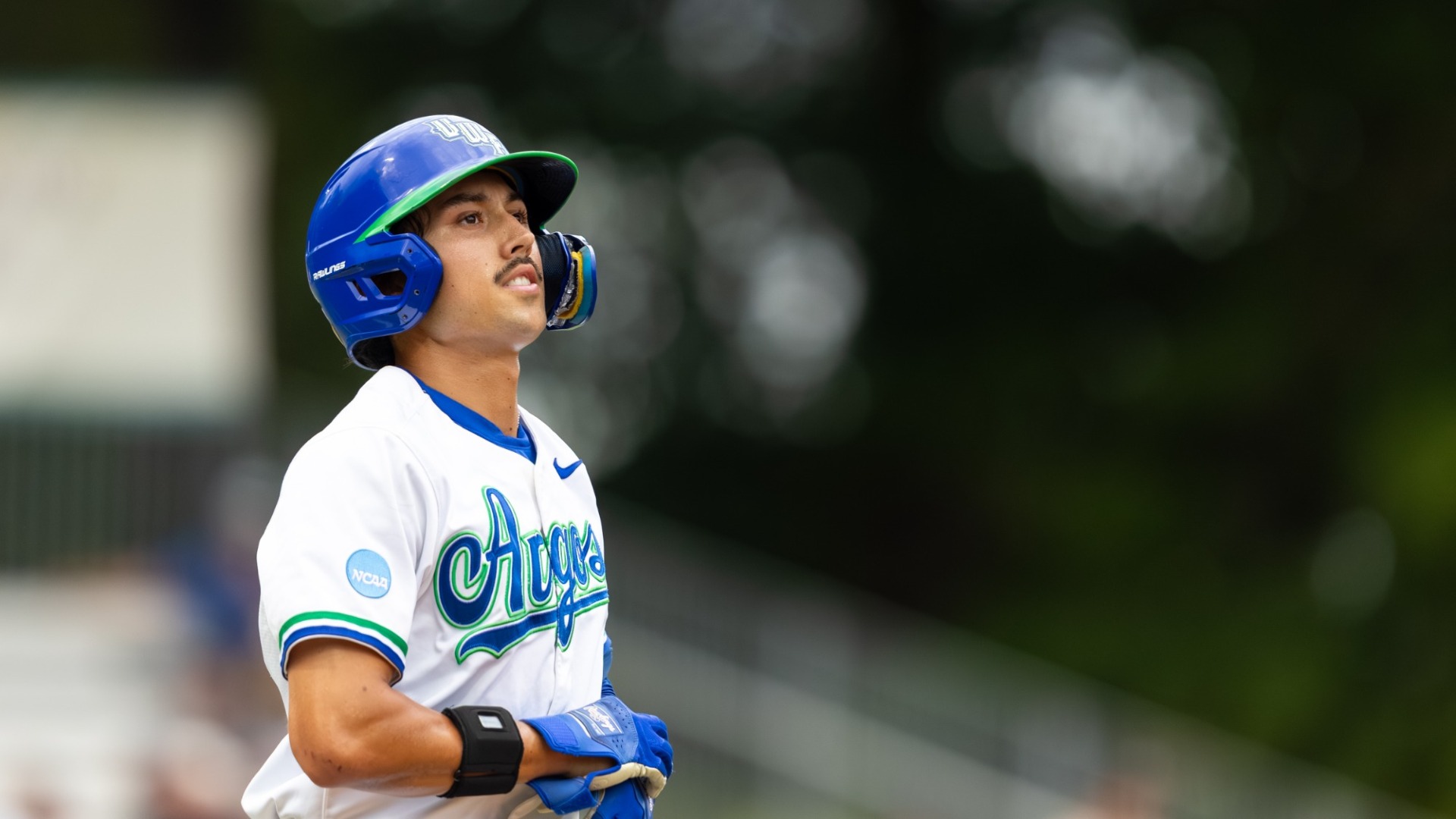 Alex Urias running to base
