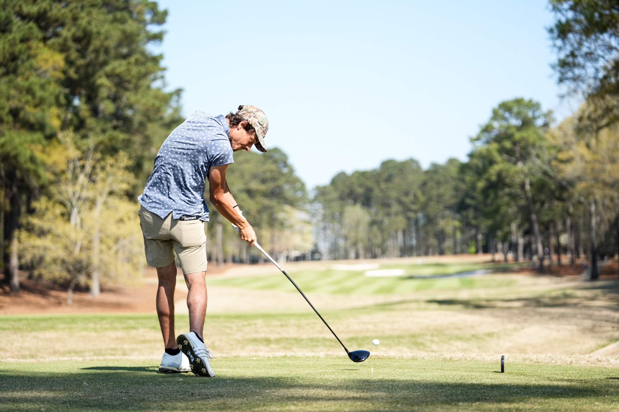 MGO at 2026 Linger Longer Invitational
UWG golfer swings club while wearing grey polo and khaki shorts.